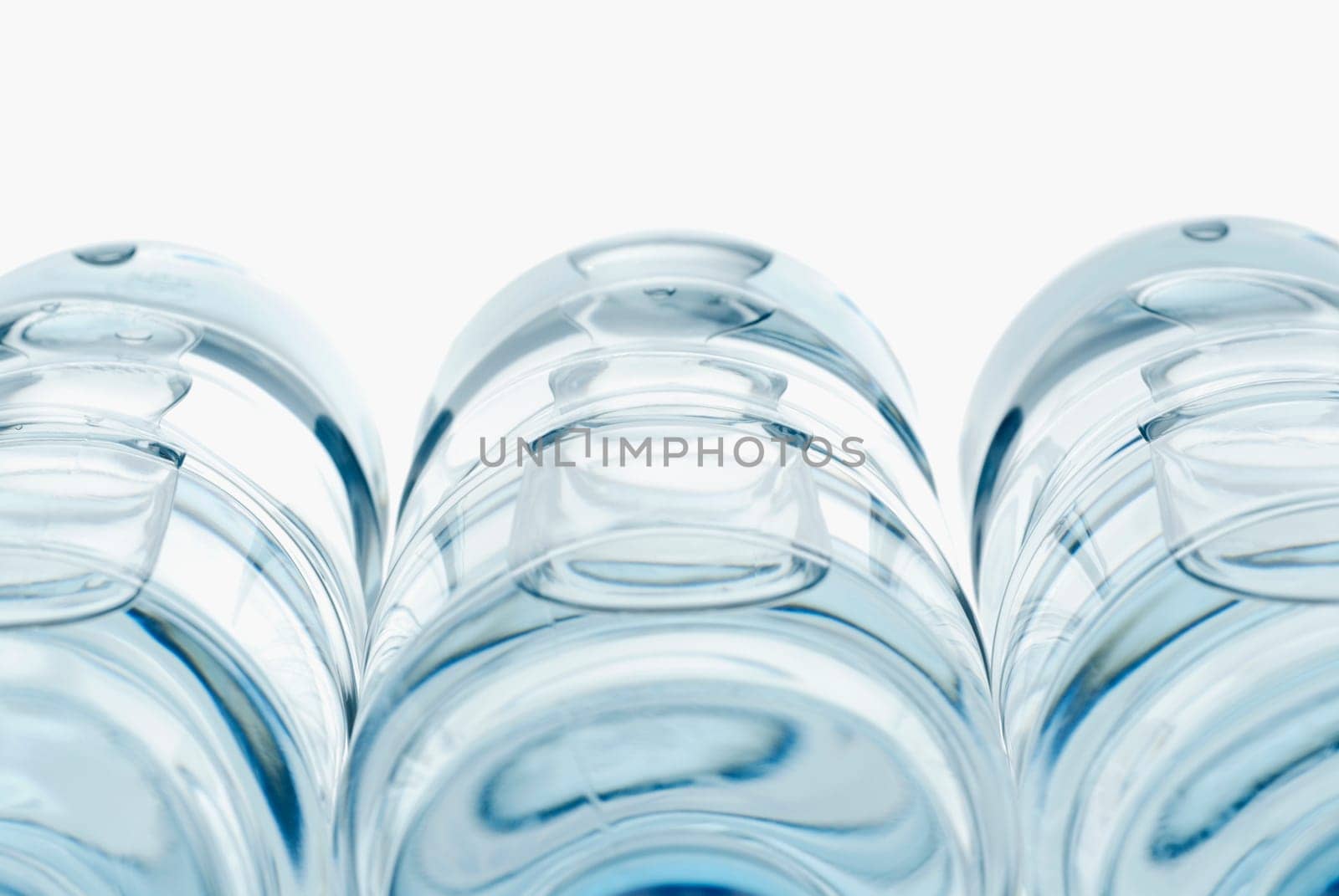 Close-up of three water bottles
