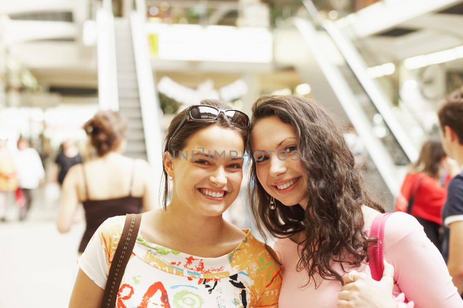 Portrait of two young women smiling