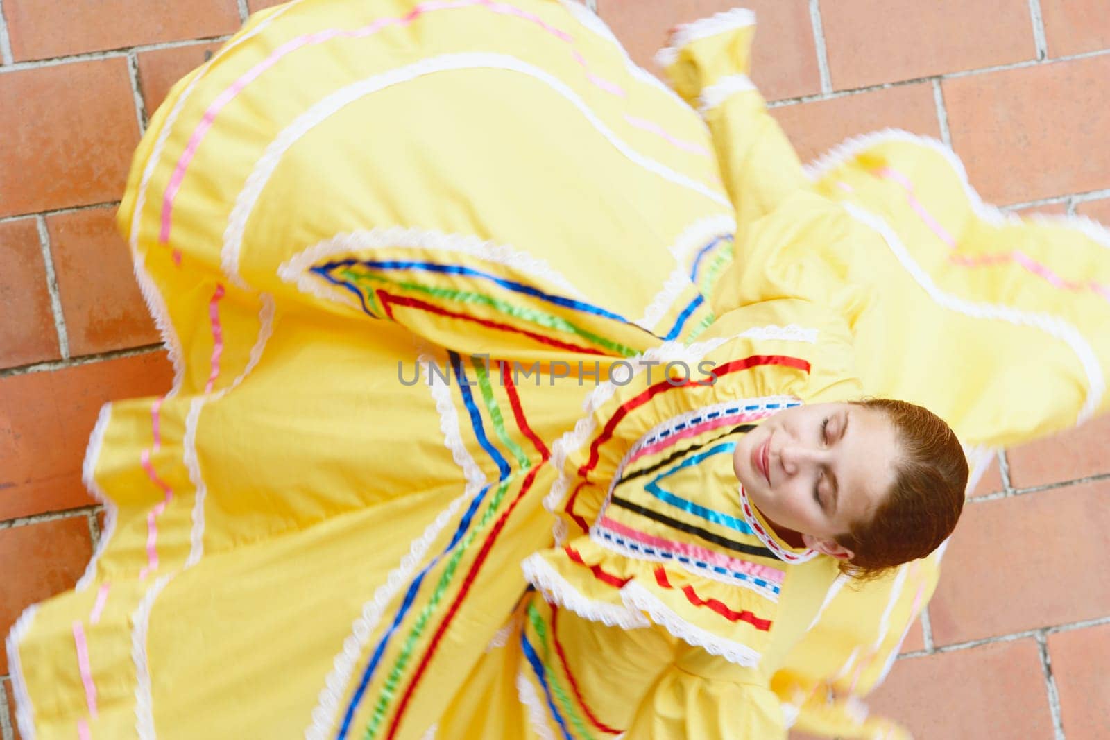 High angle view of a young woman dancing