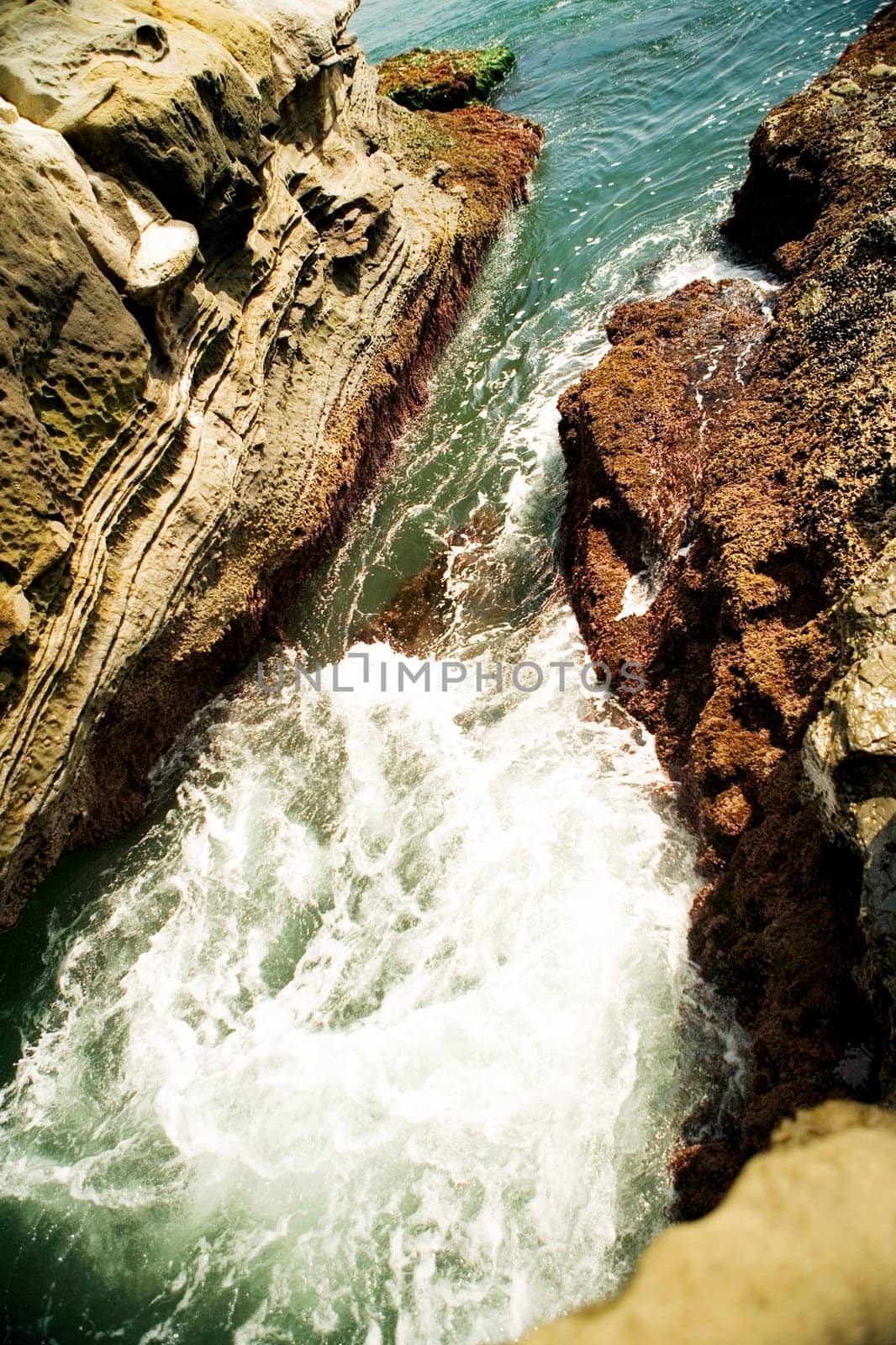 High angle view of water flowing over a rock formation, La Jolla Reefs, San Diego Bay, California, USA