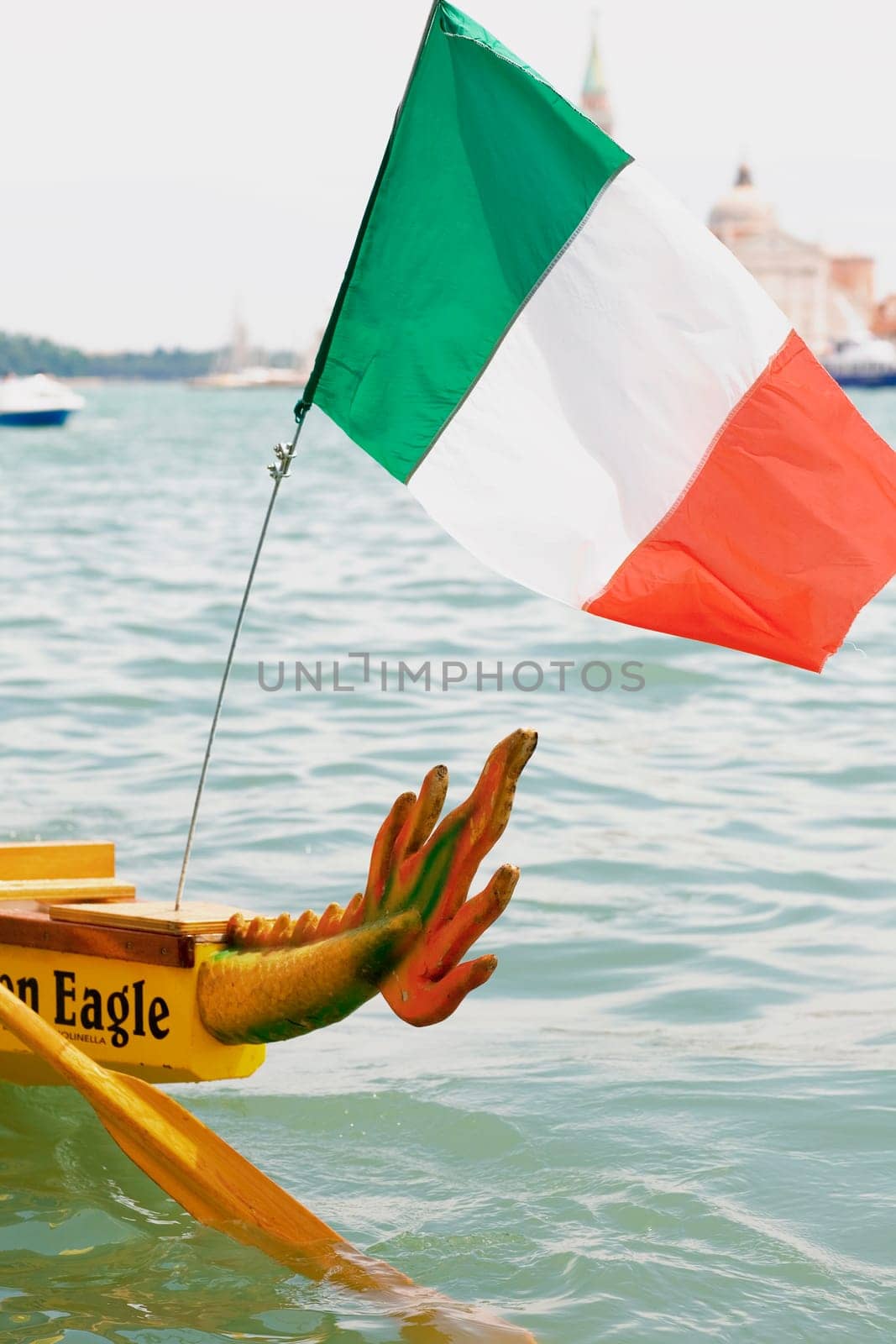 Italian flag on a boat, Venice, Veneto, Italy