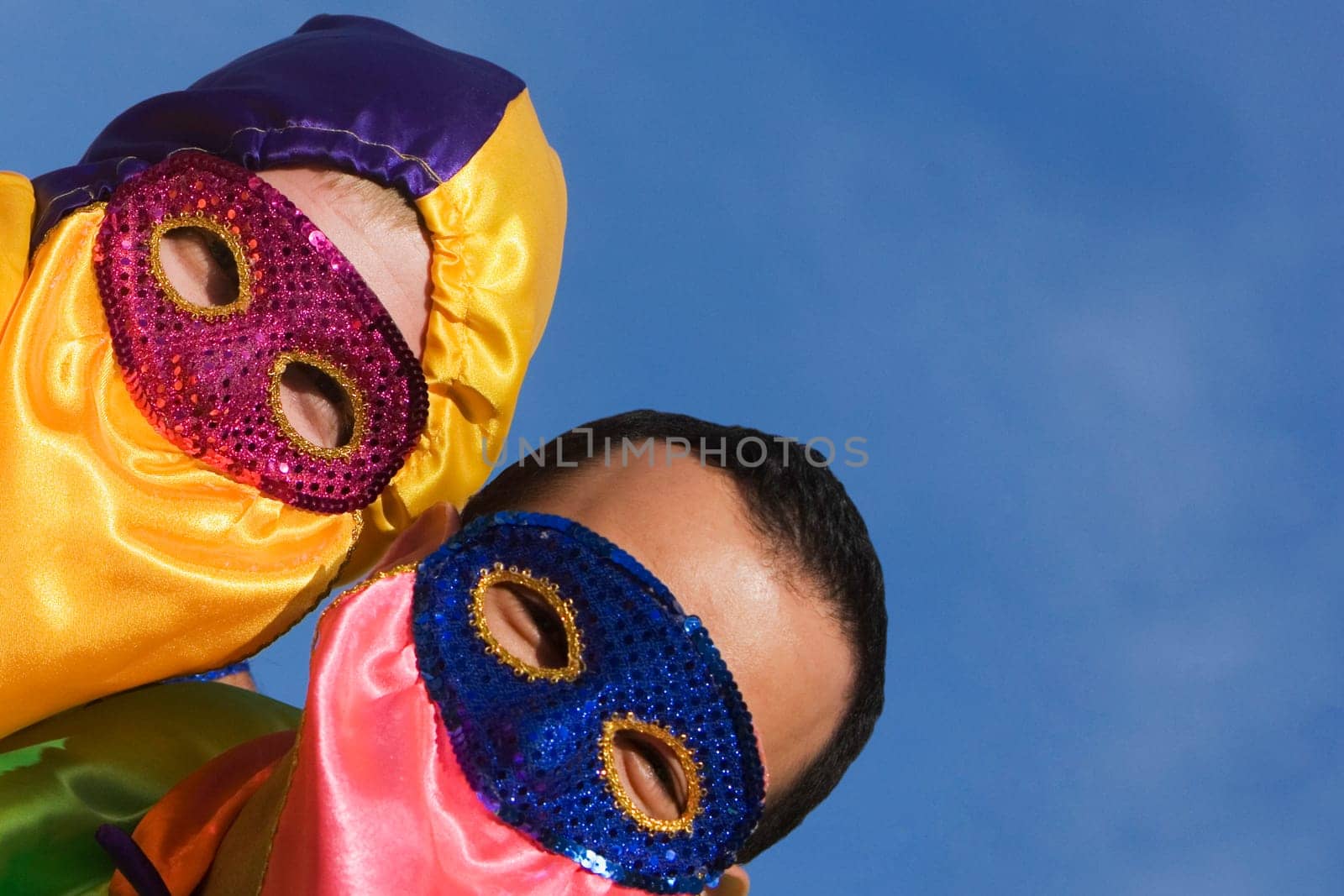 Close-up of two men wearing costumes