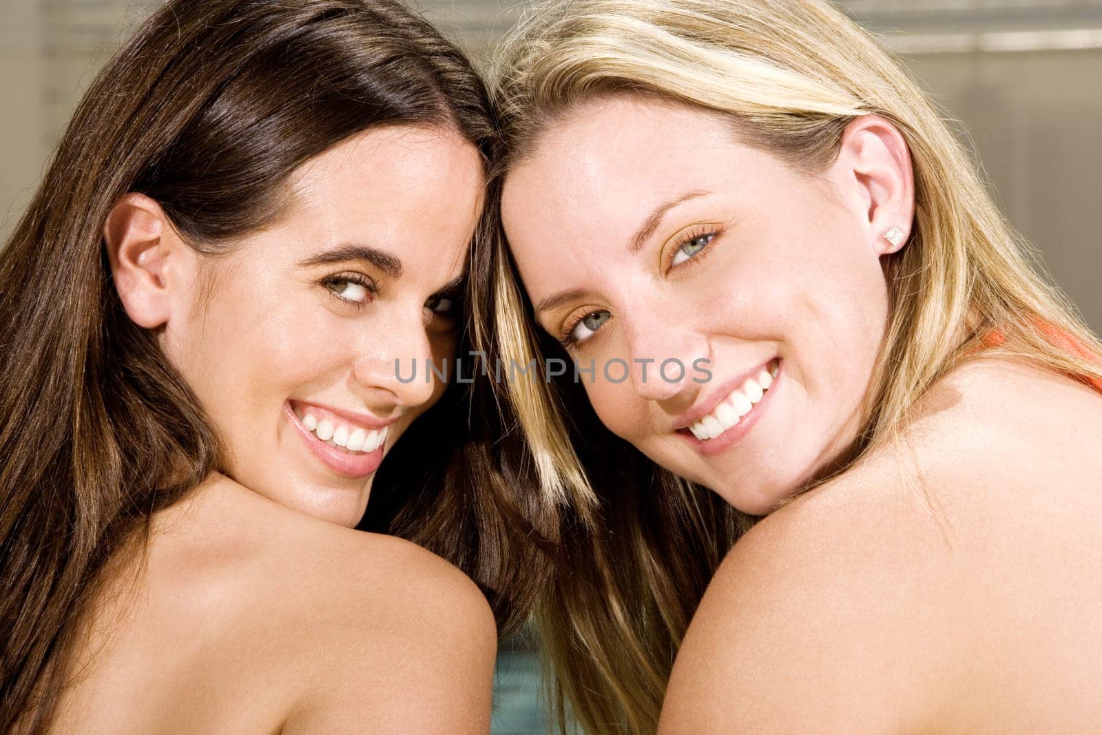 Portrait of two young women smiling