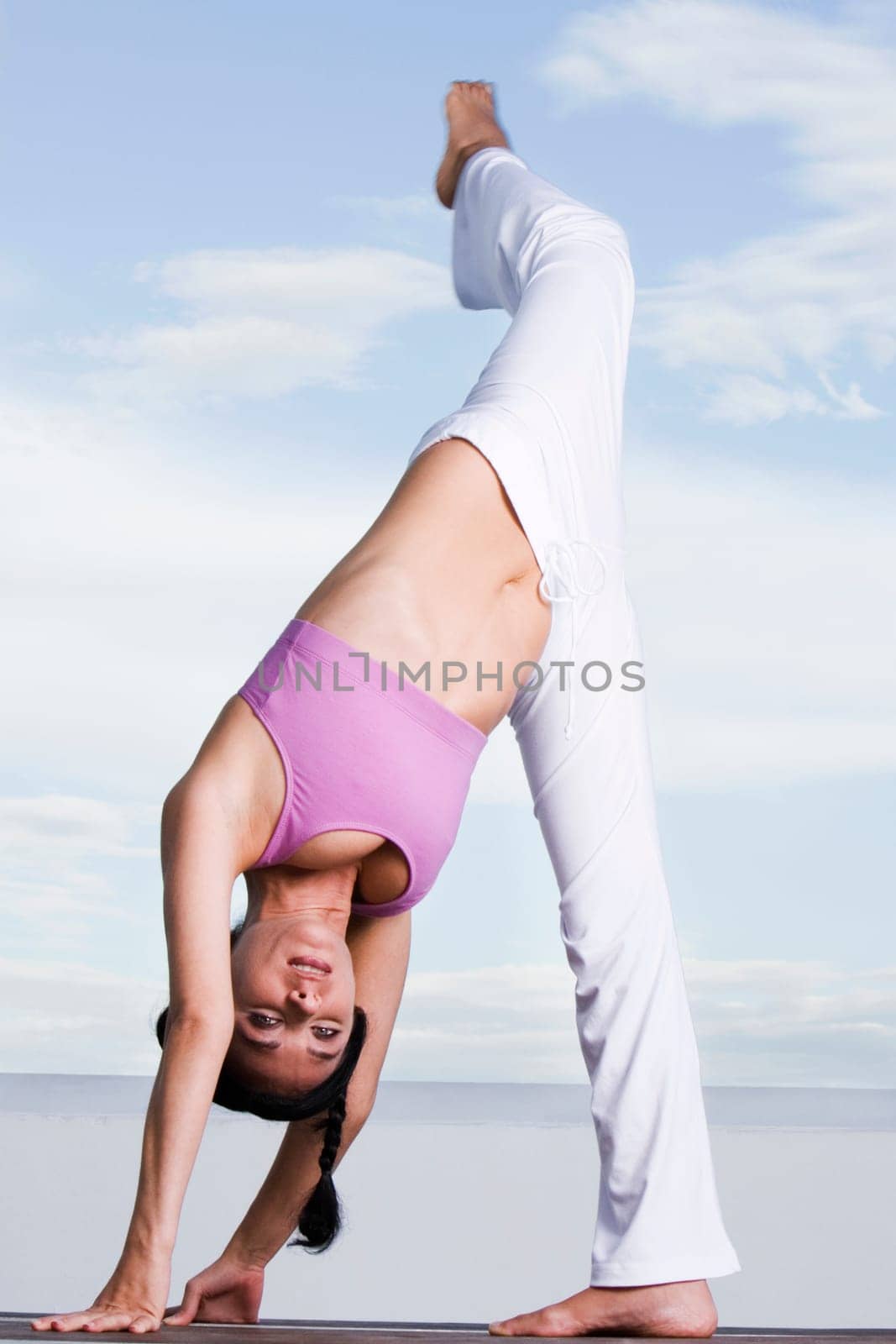 Portrait of a young woman exercising