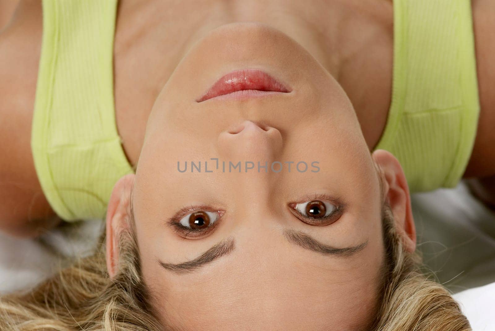 Close-up of a young woman lying down
