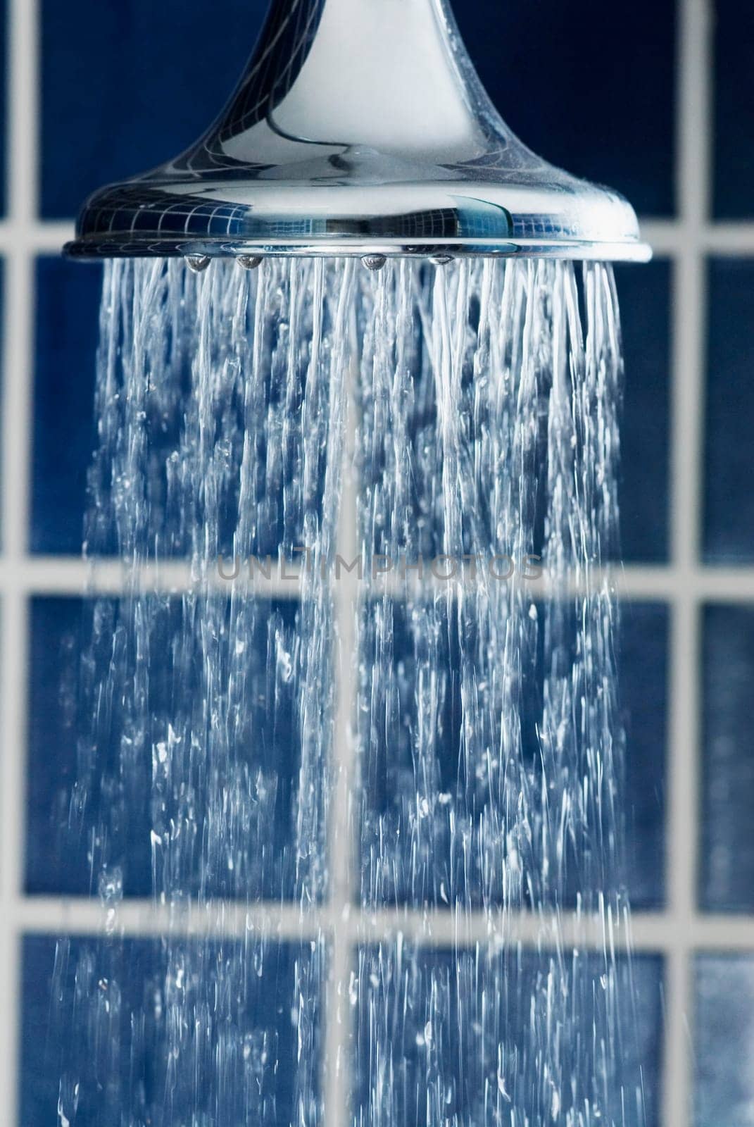 Water flowing out of a shower head