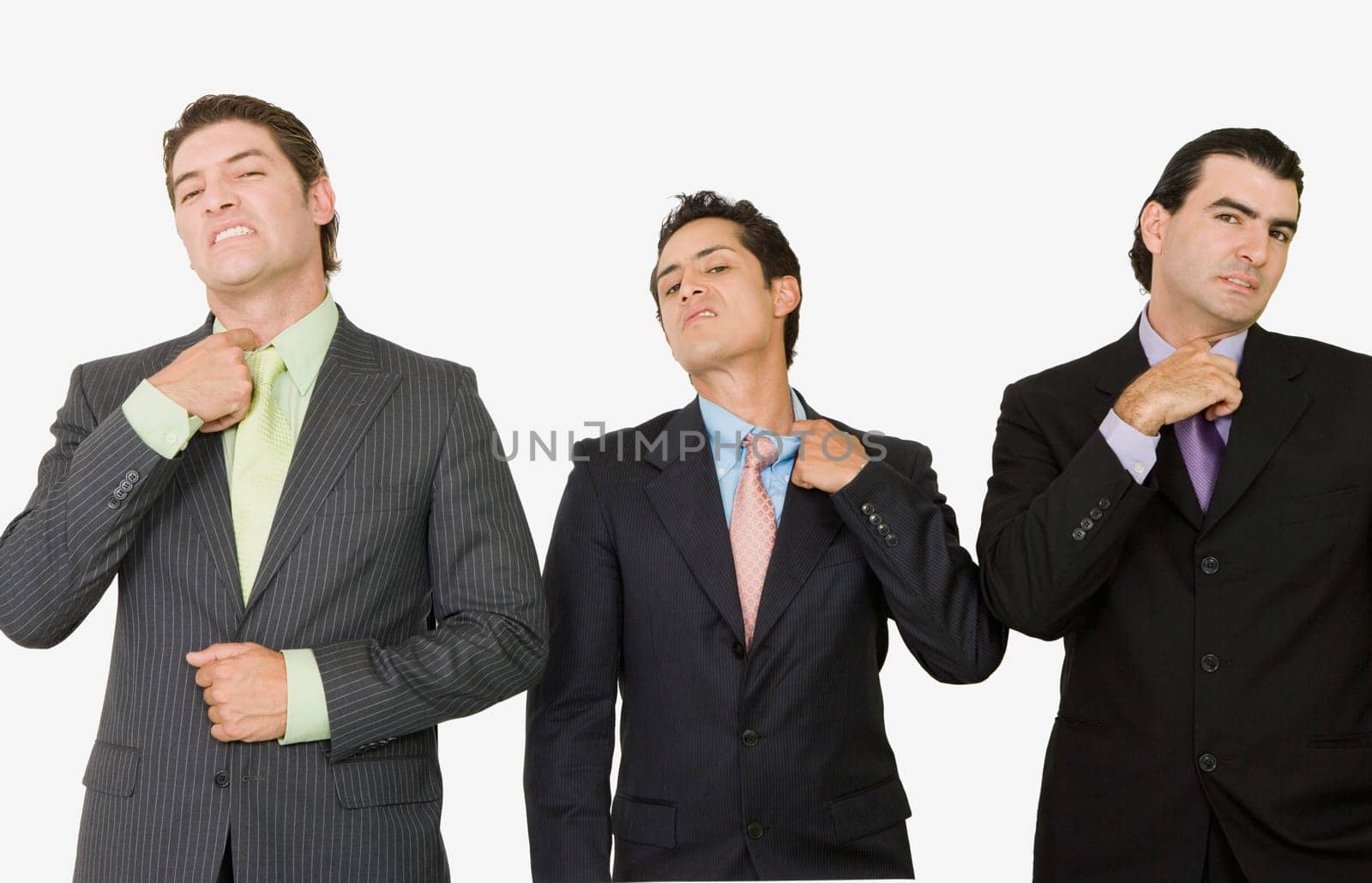 Portrait of three businessmen looking exhausted