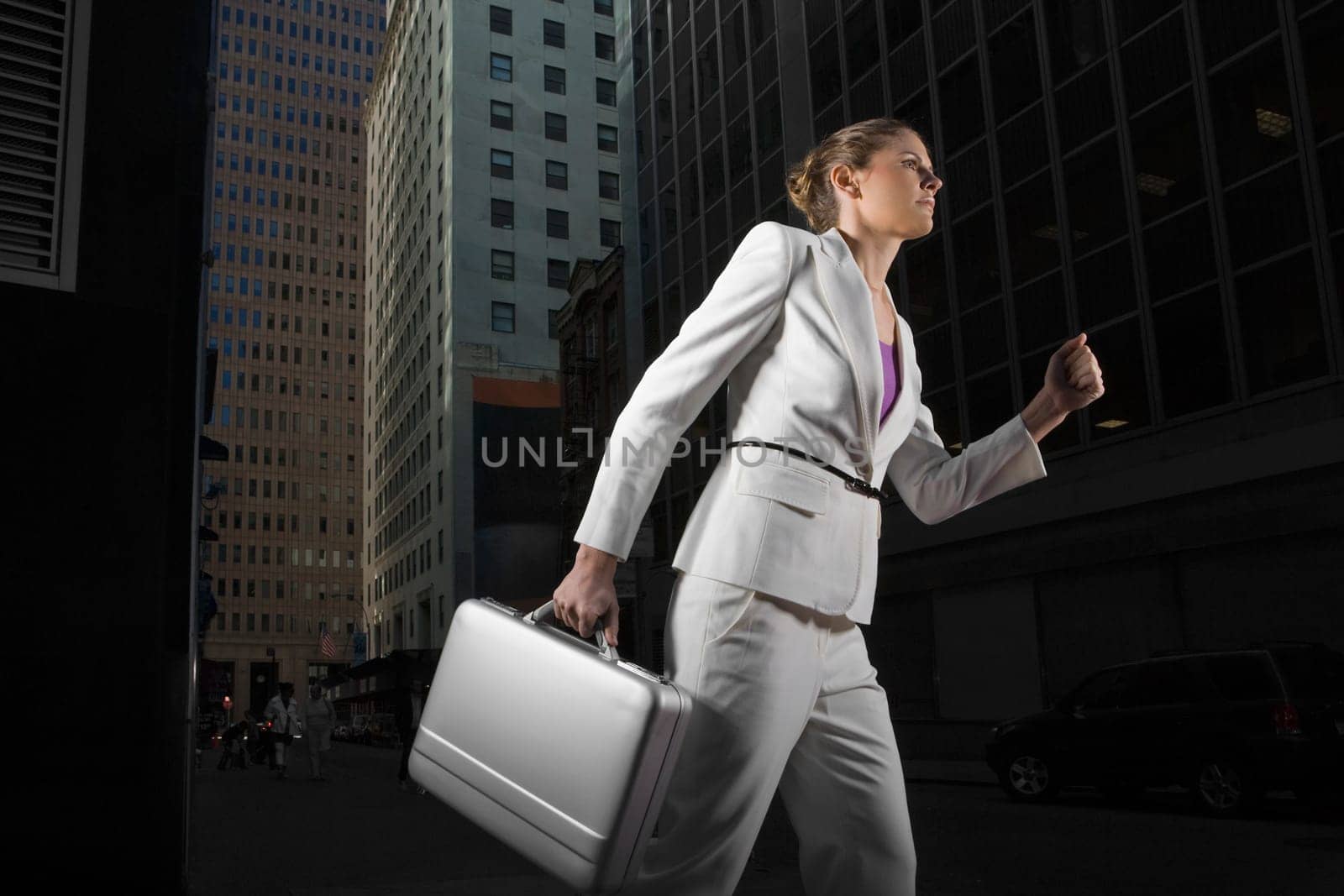 Low angle view of a businesswoman carrying a briefcase