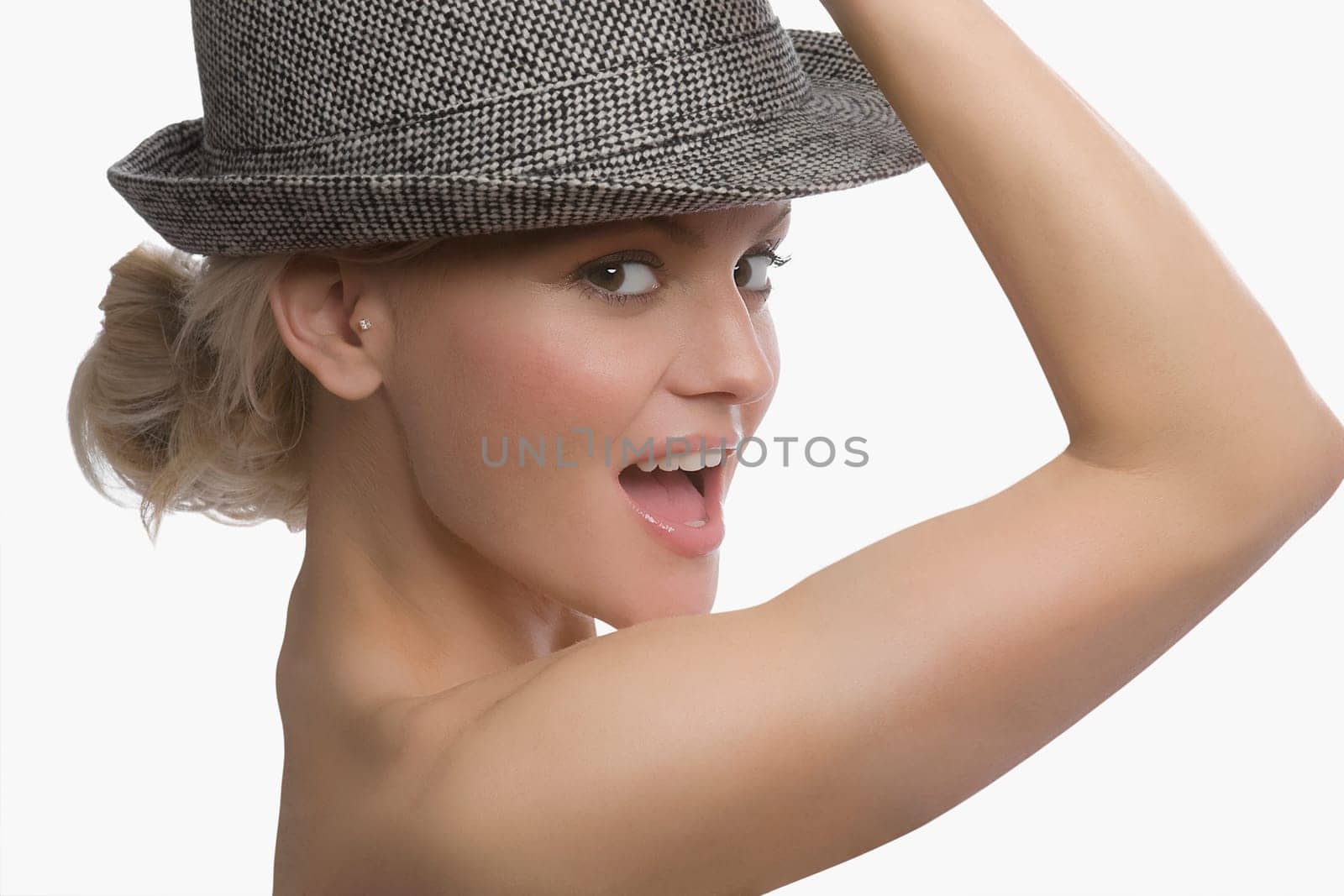 Portrait of a young woman wearing a hat