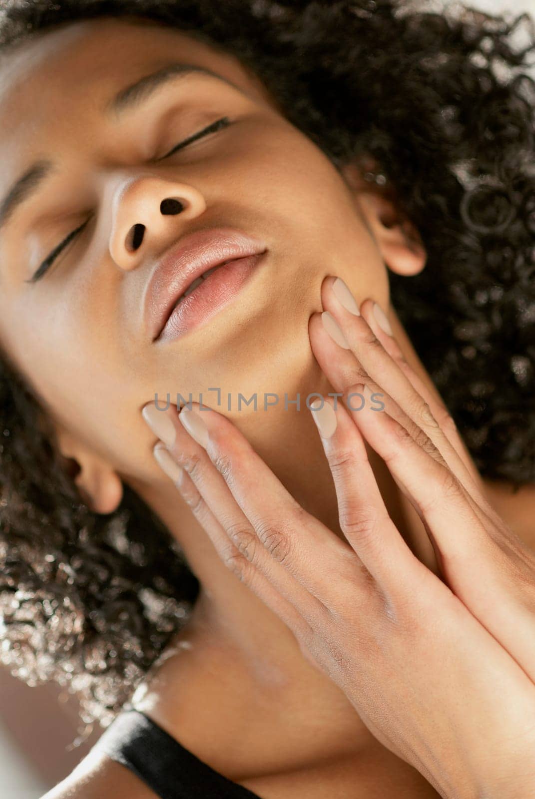 Close-up of a young woman with her eyes closed