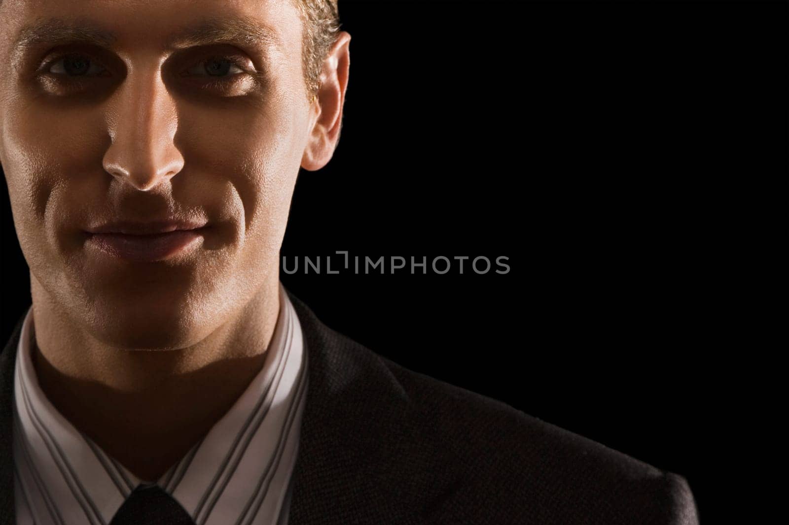 Close_up of a businessman smiling