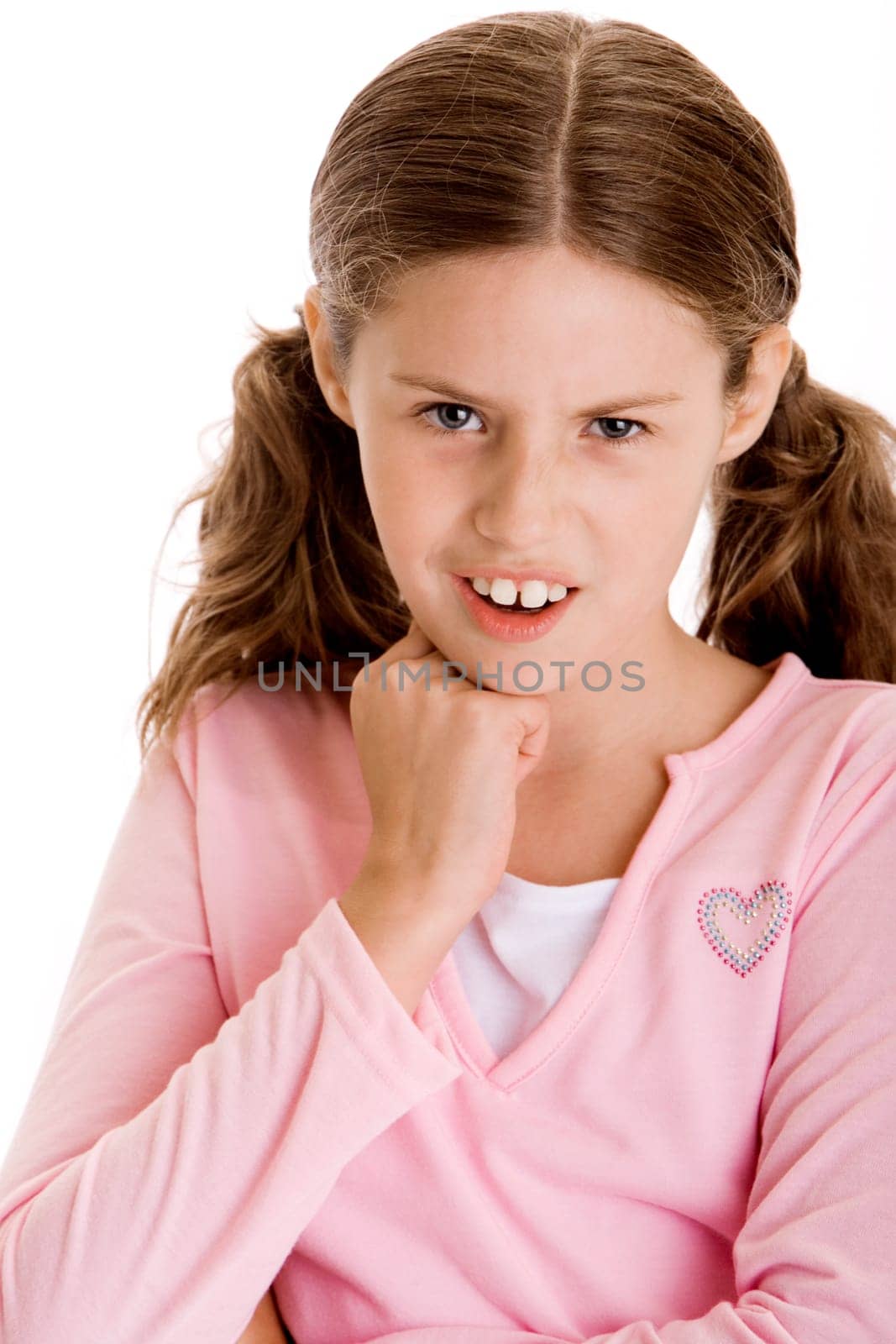 Portrait of a girl with her hand on her chin