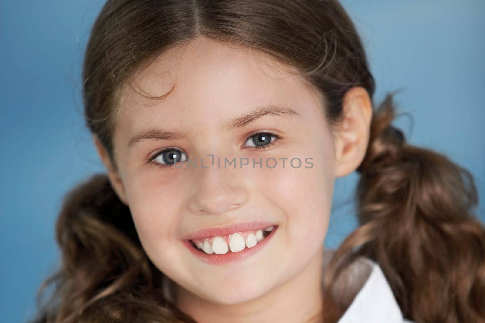 Close-up of a girl smiling