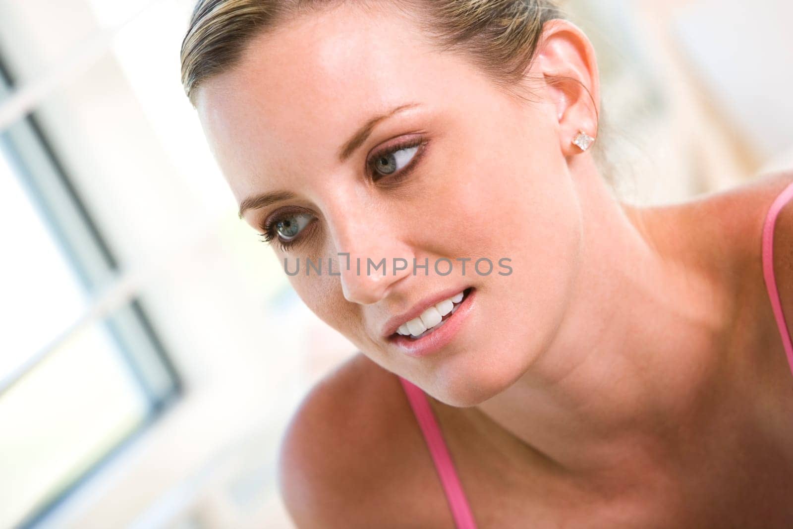 Close-up of a young woman looking away