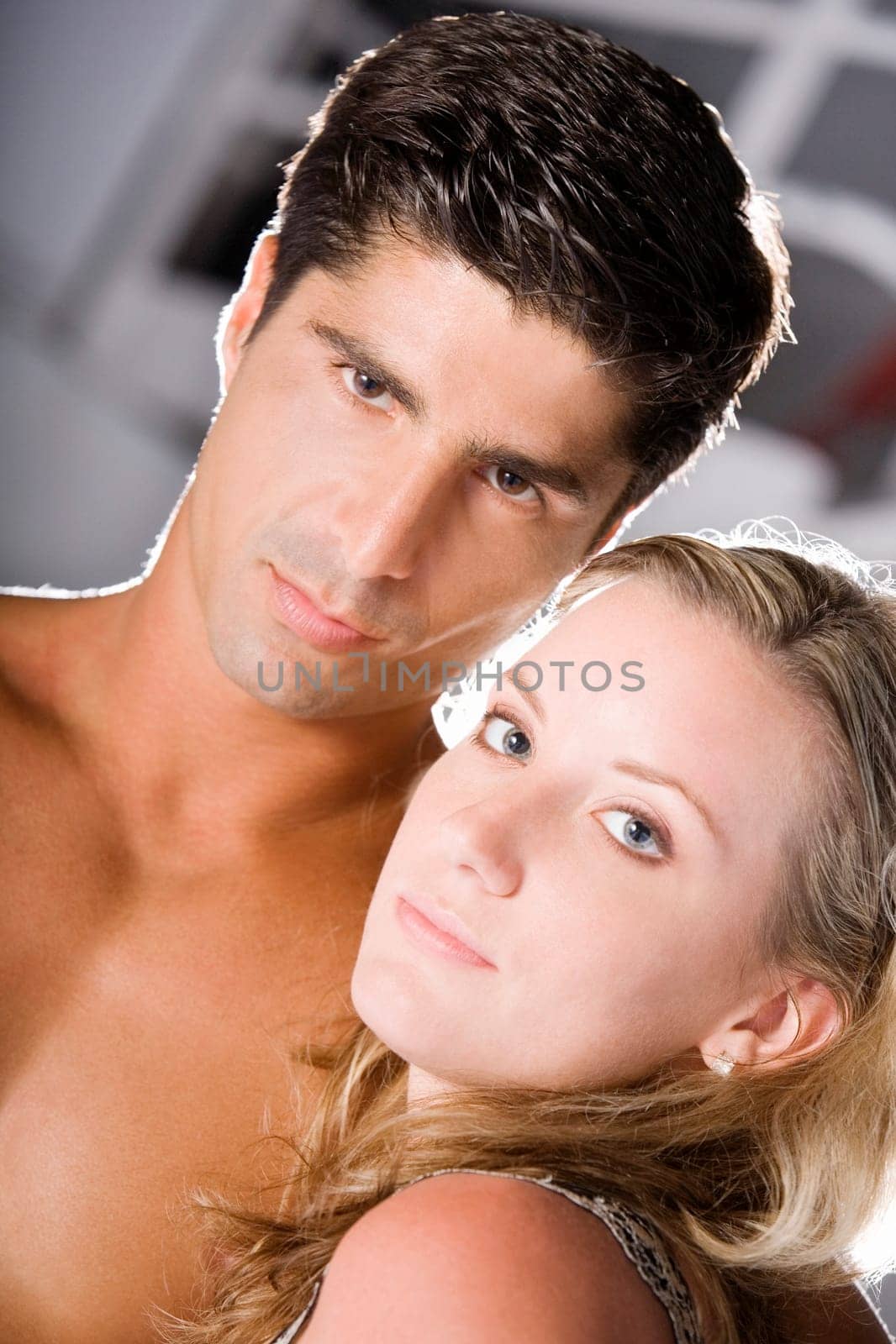Portrait of a young woman and a mid adult man