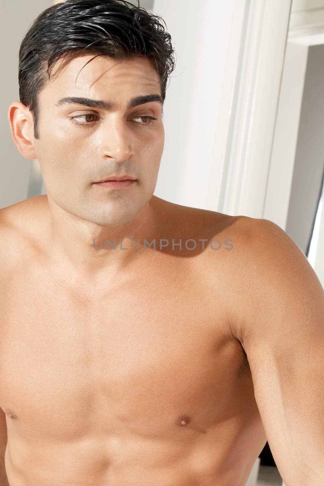 Close-up of a young man looking sideways