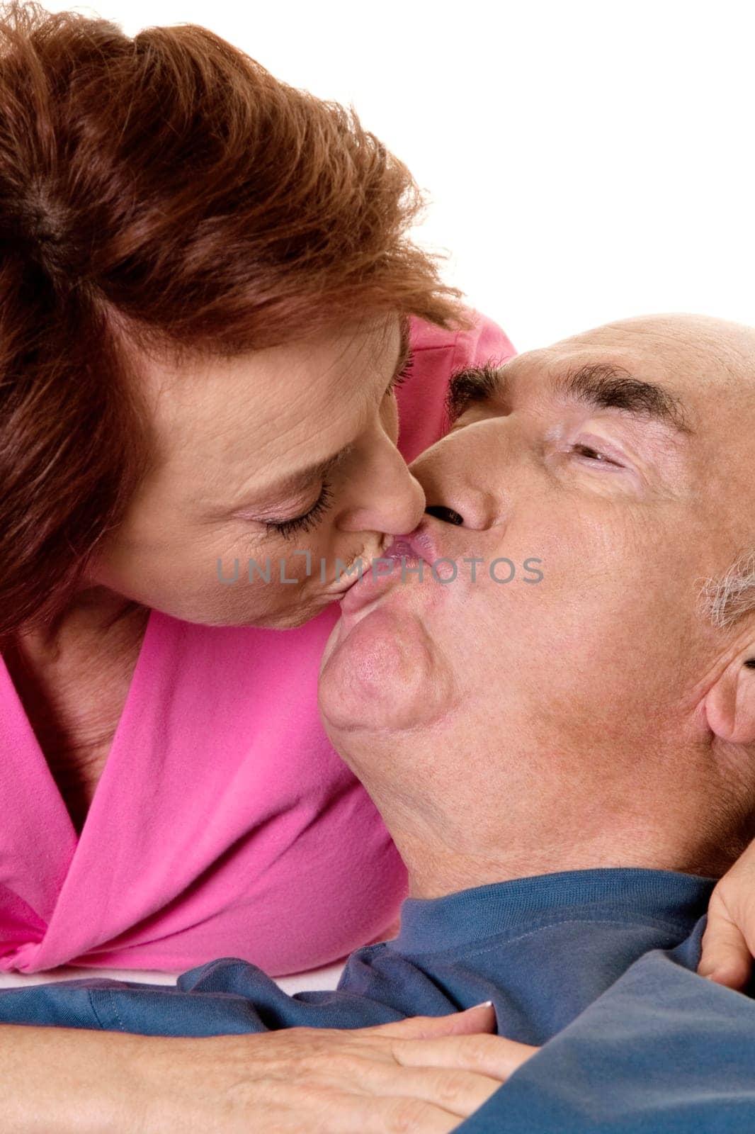 Close-up of a senior couple kissing