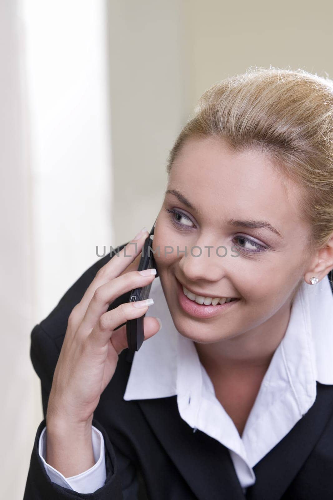 Close-up of a businesswoman talking on a mobile phone