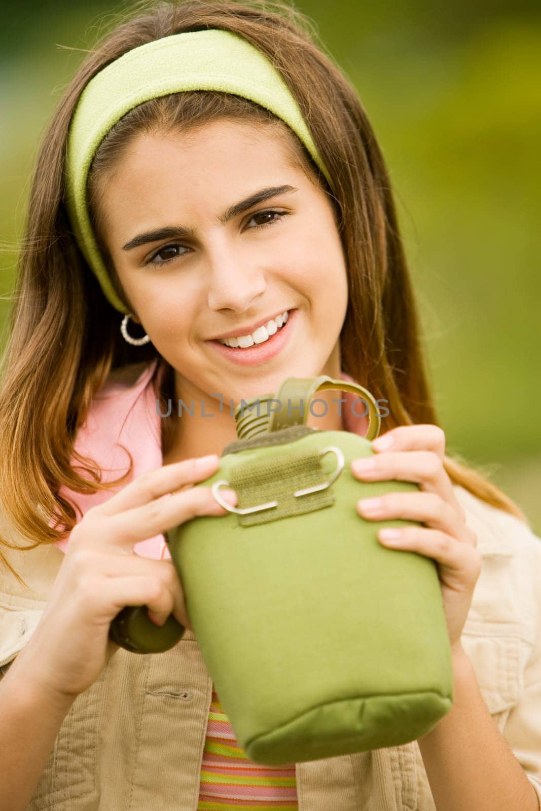 Portrait of a girl holding a water bottle