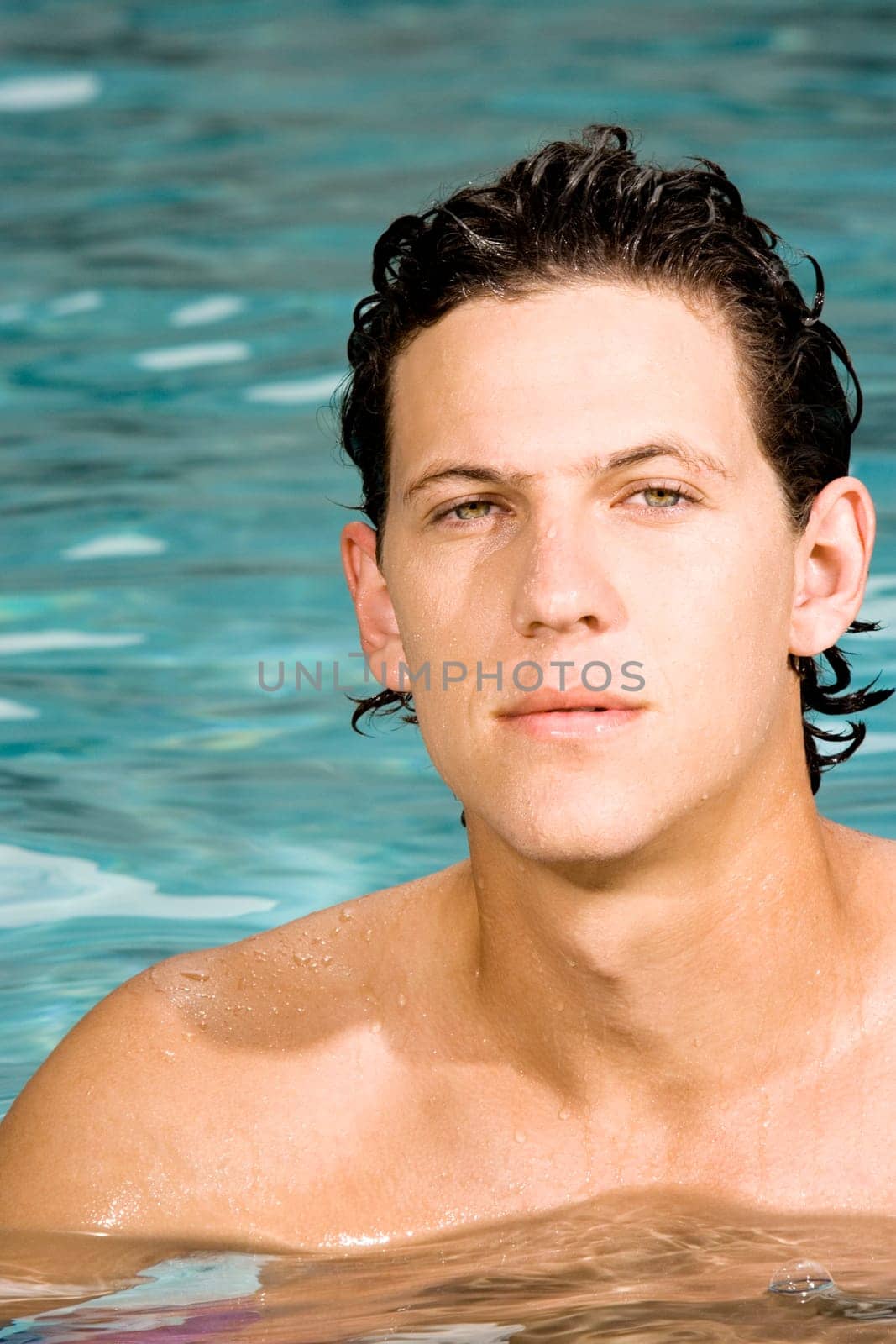 Close-up of a young man in a swimming pool