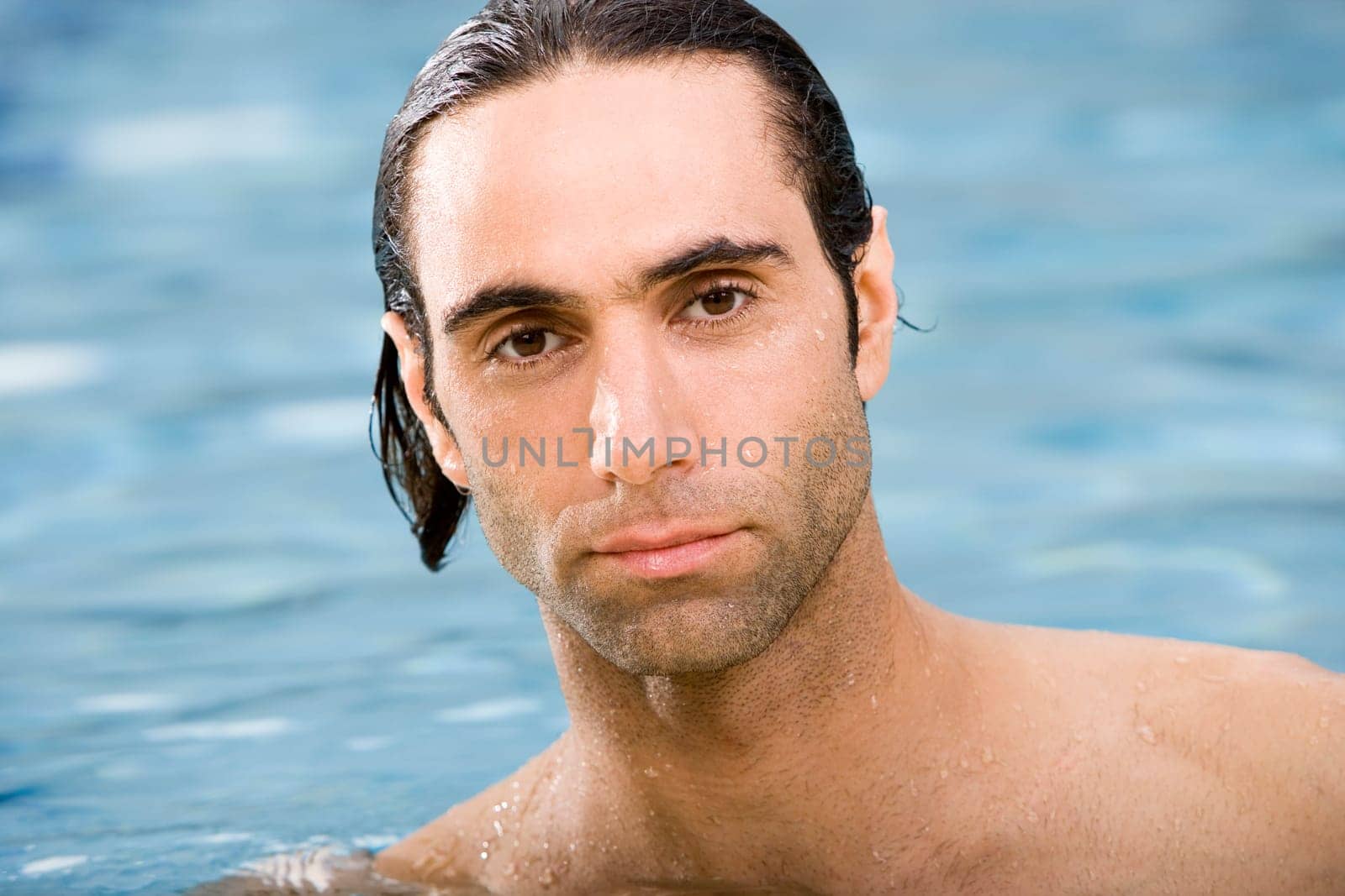Portrait of a mid adult man in a swimming pool