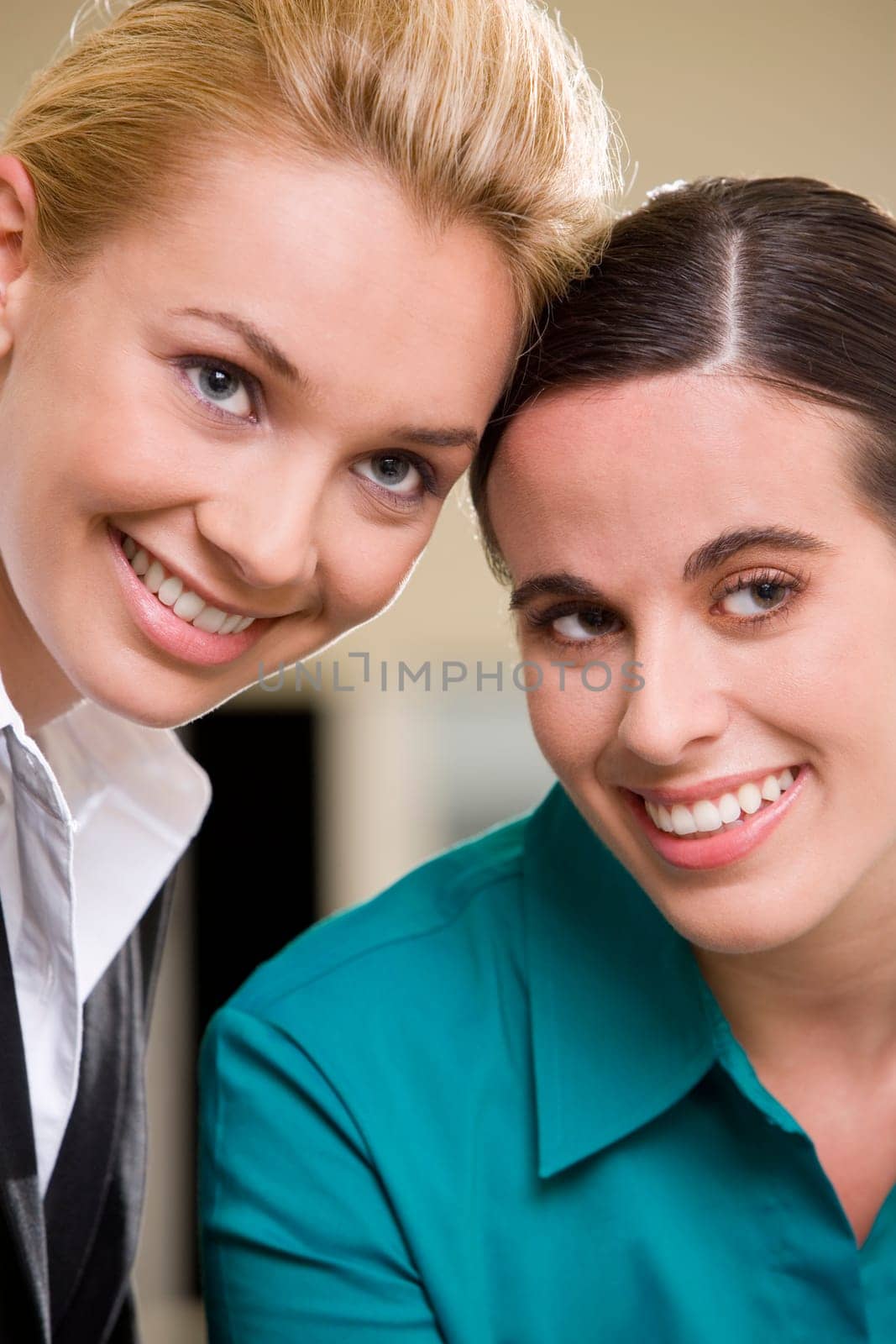 Portrait of two young women smiling