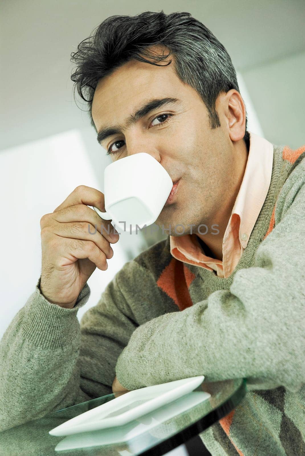 Portrait of a mature man drinking tea