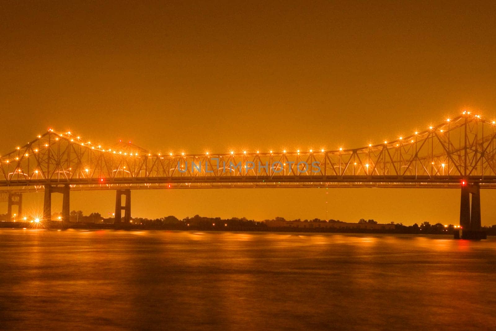 Bridge lit up at night, Mississippi River, New Orleans, Louisiana, USA