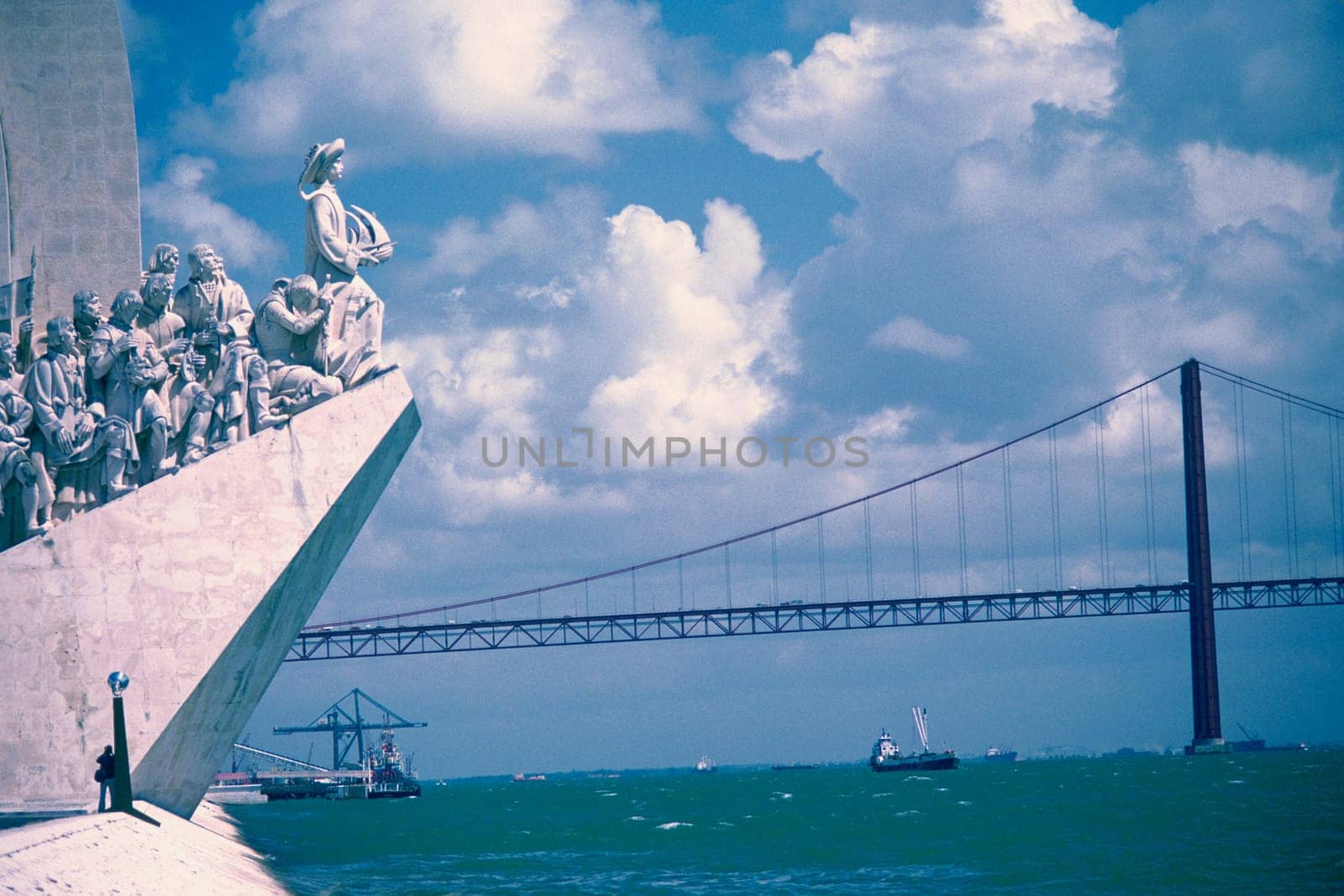 Statues in front of a bridge, Monument to the Discoveries, Belem, Lisbon, Portugal