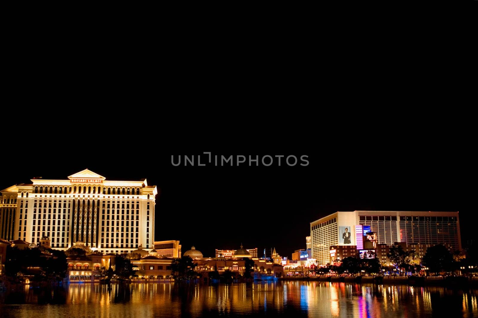 Buildings at the waterfront lit up at night, Las Vegas, Nevada, USA