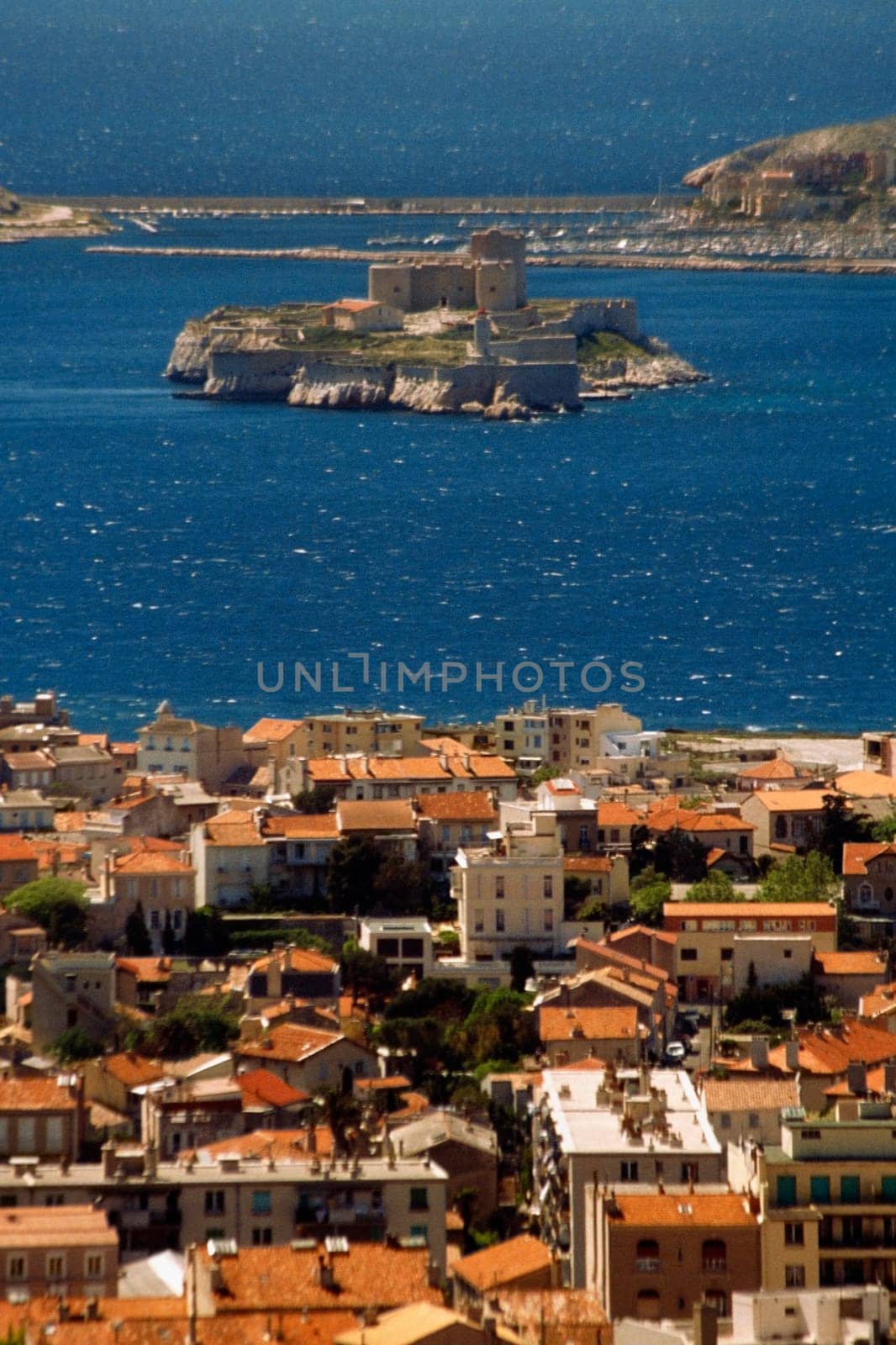 High angle view of a modern city and Chateau DŽIF, Marseille, France
