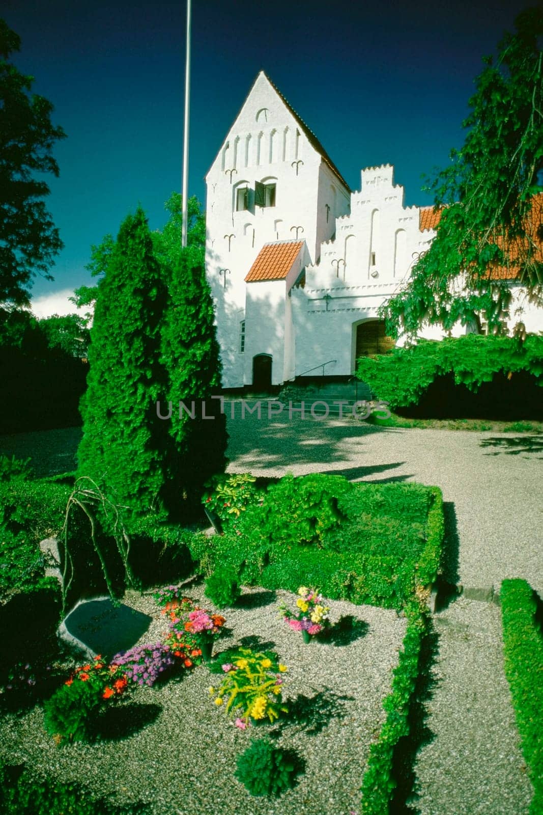 Cemetery in front of a church, Funen County, Denmark