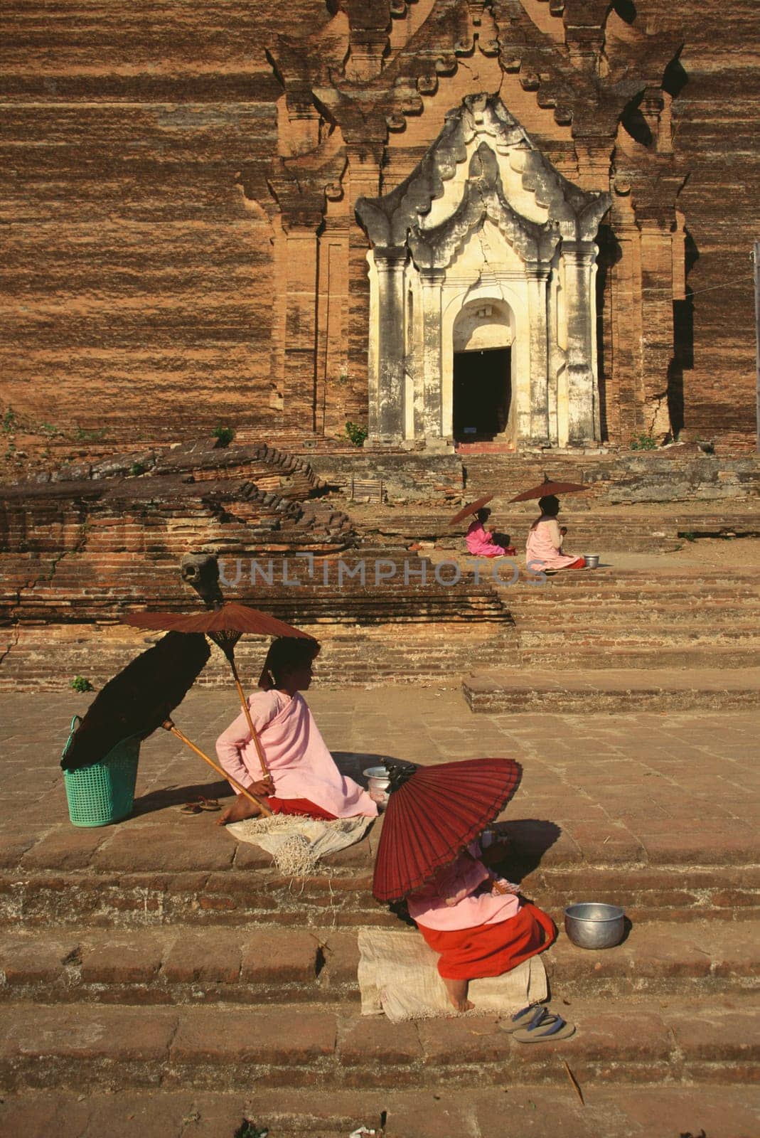 High angle view of beggars begging in front of a temple, Mingun, Sagaing Divison, Myanmar