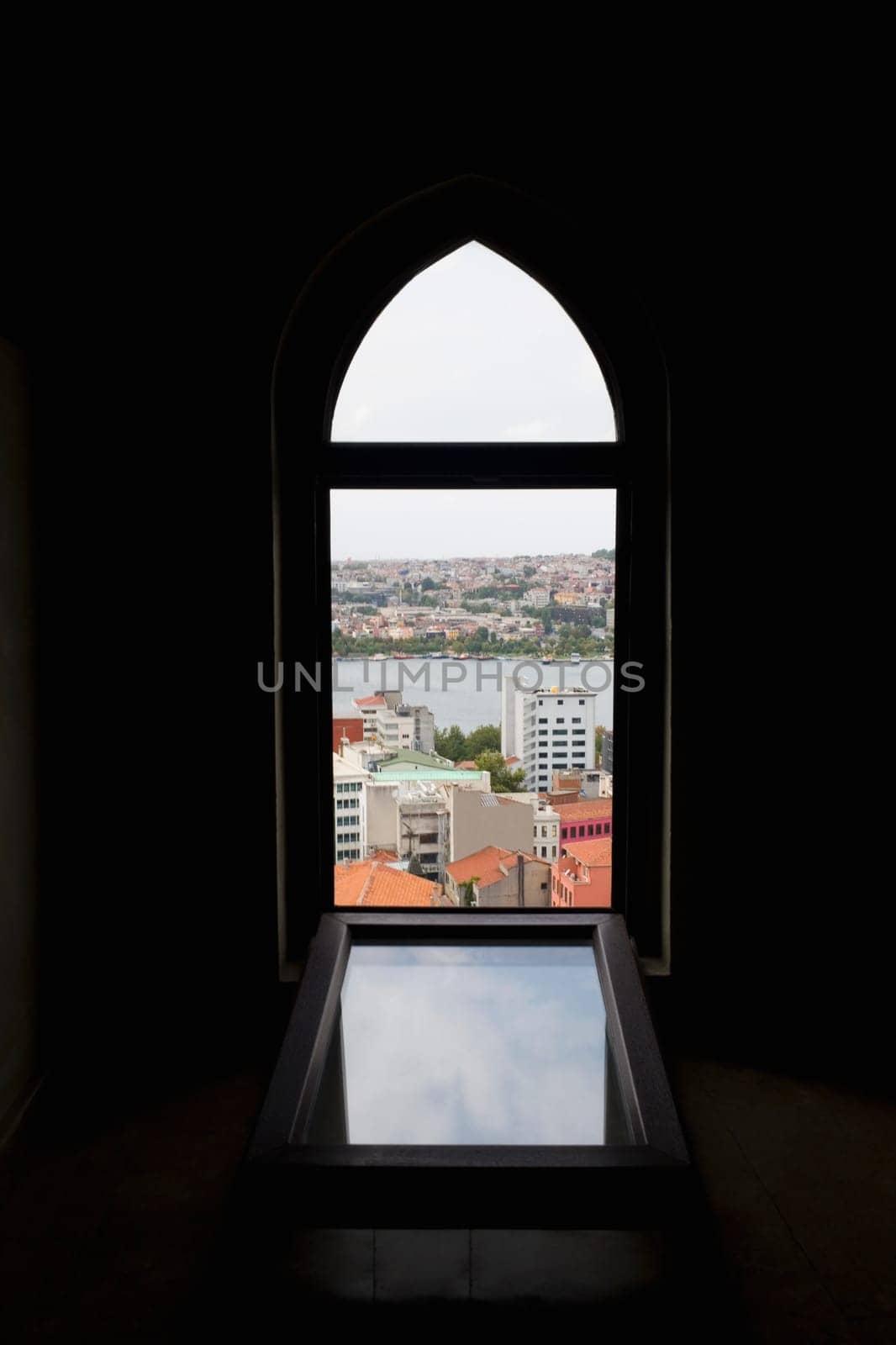 City viewed through an arched window of a building, Istanbul, Turkey
