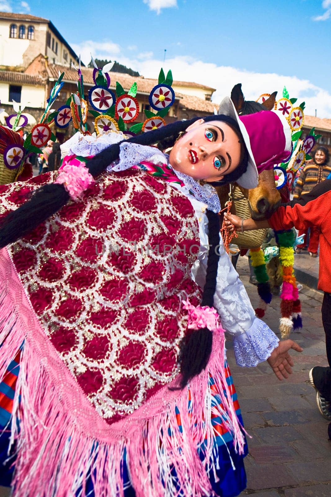 Close-up of a woman wearing a traditional costume and dancing, Peru