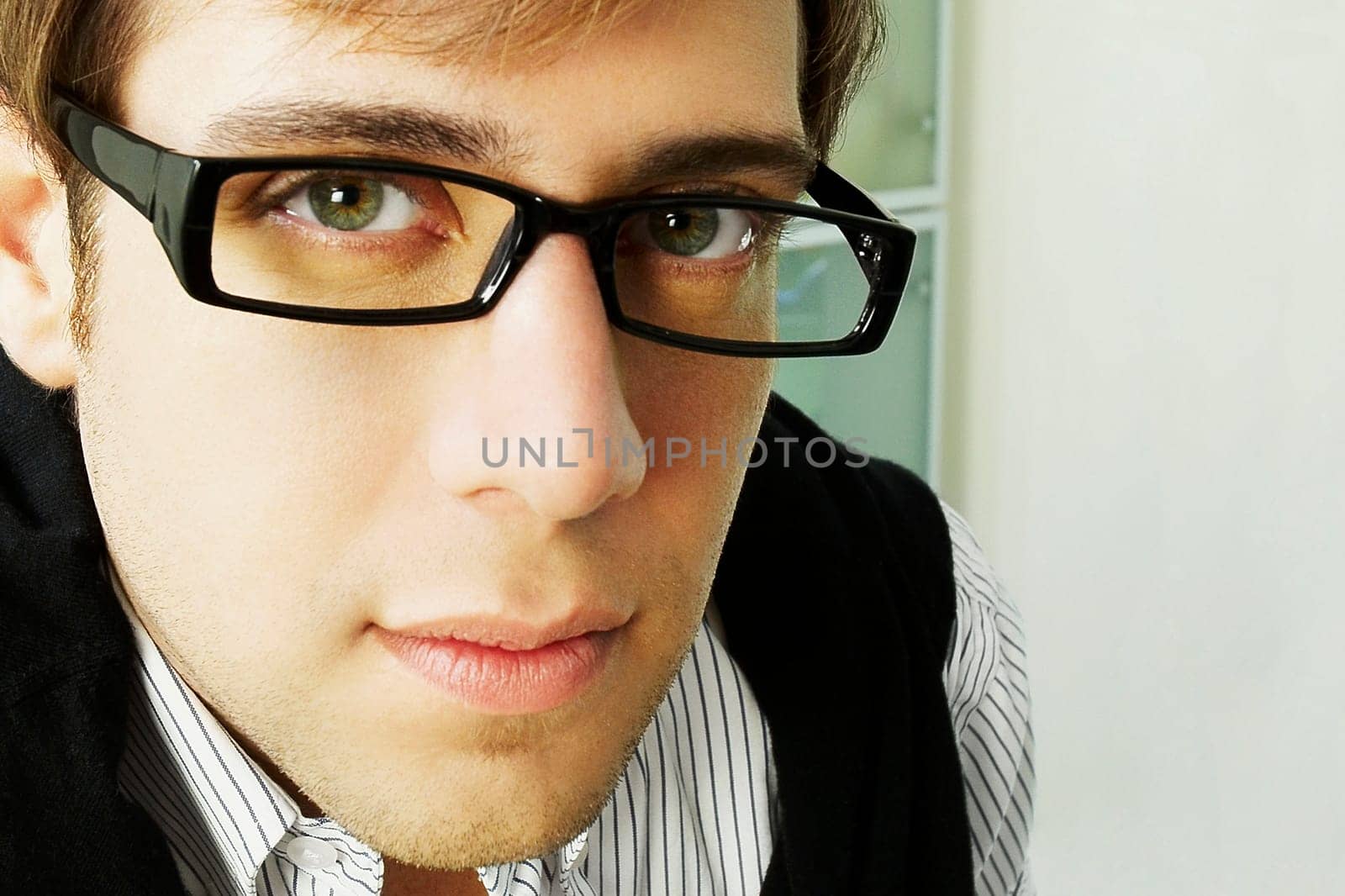 Close_up of a young man looking serious