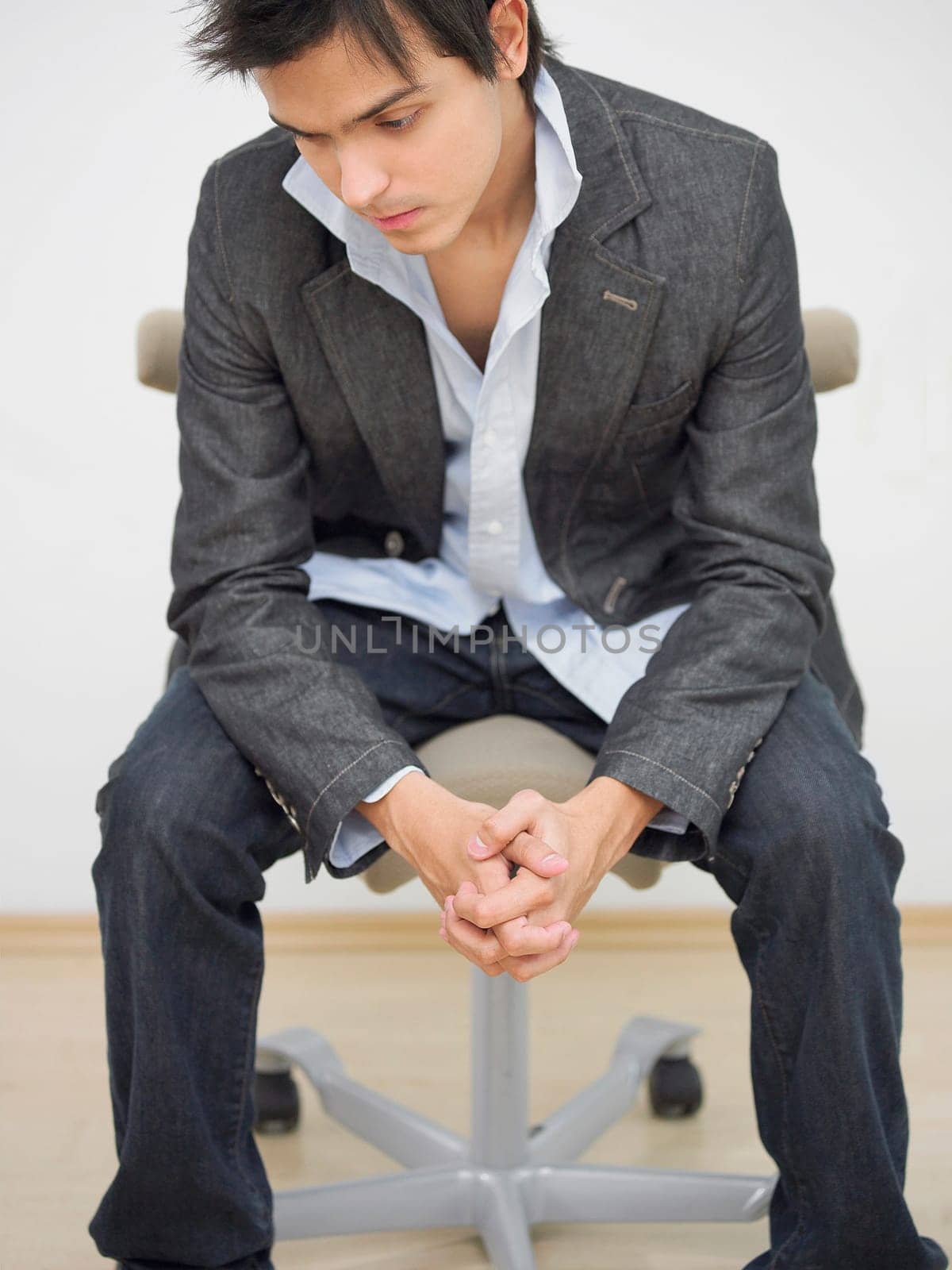 Close_up of a young man looking sad