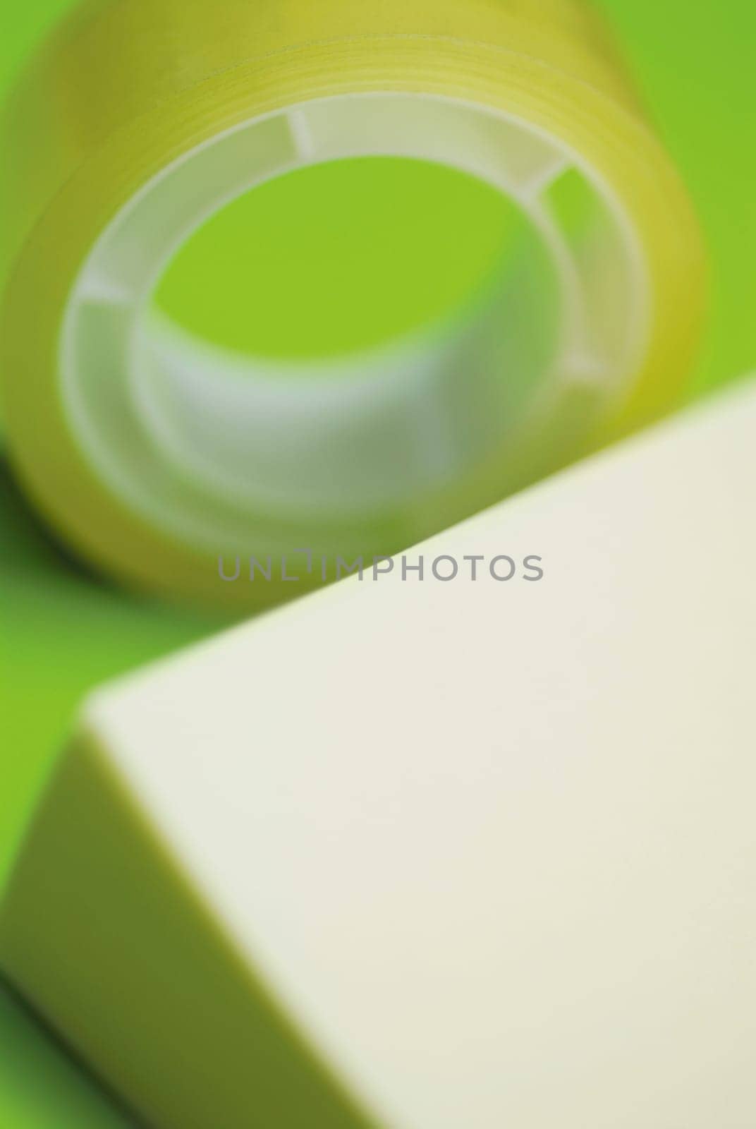 Close_up of an adhesive note with an adhesive tape