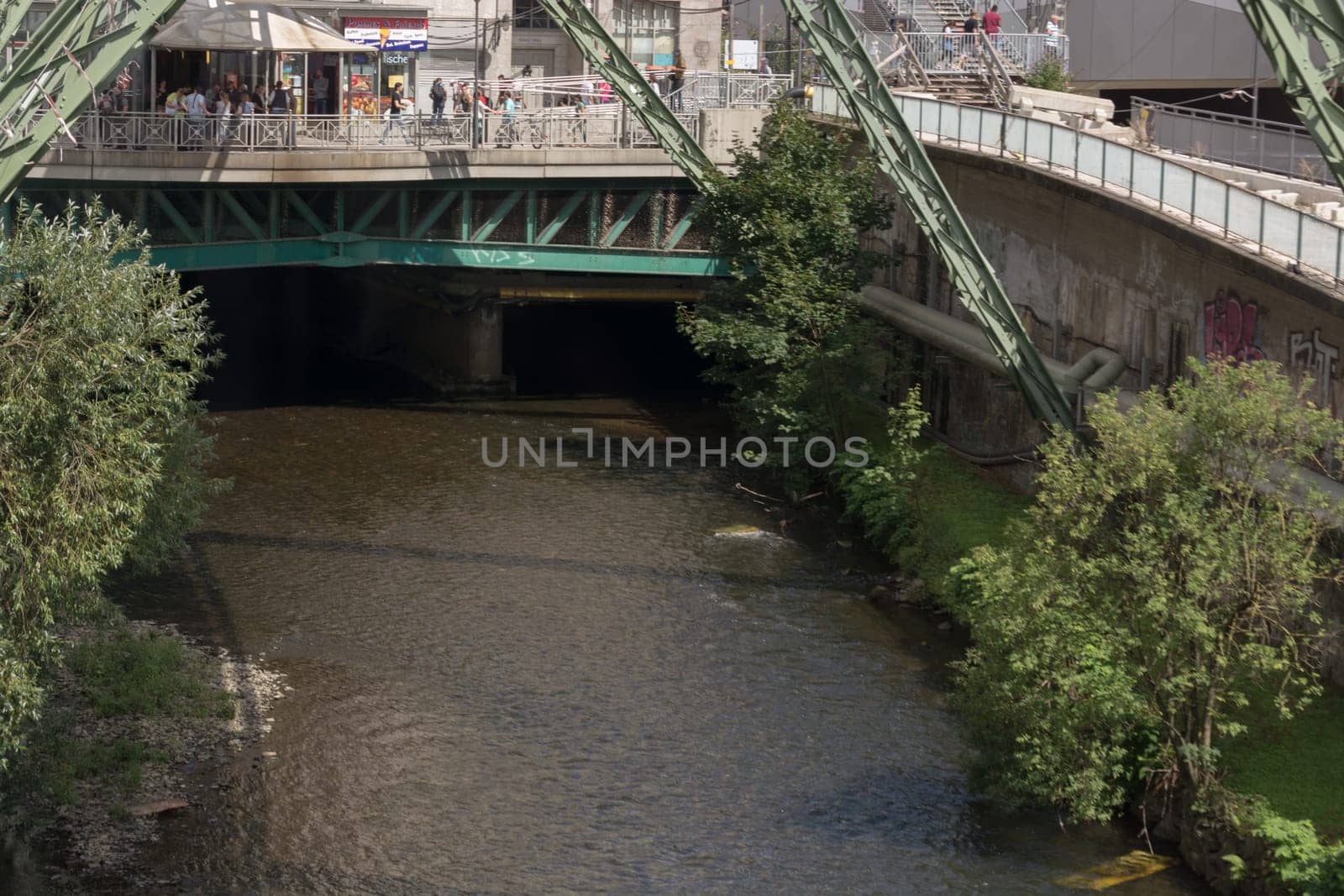 WUPPERTAL  NRW  GERMANY - JULY 31  2017:...The supporting framework of the Wuppertaler suspension railway consists of a steel framework with inclined supports and suspended steel bridges so-called Rieppelträger.