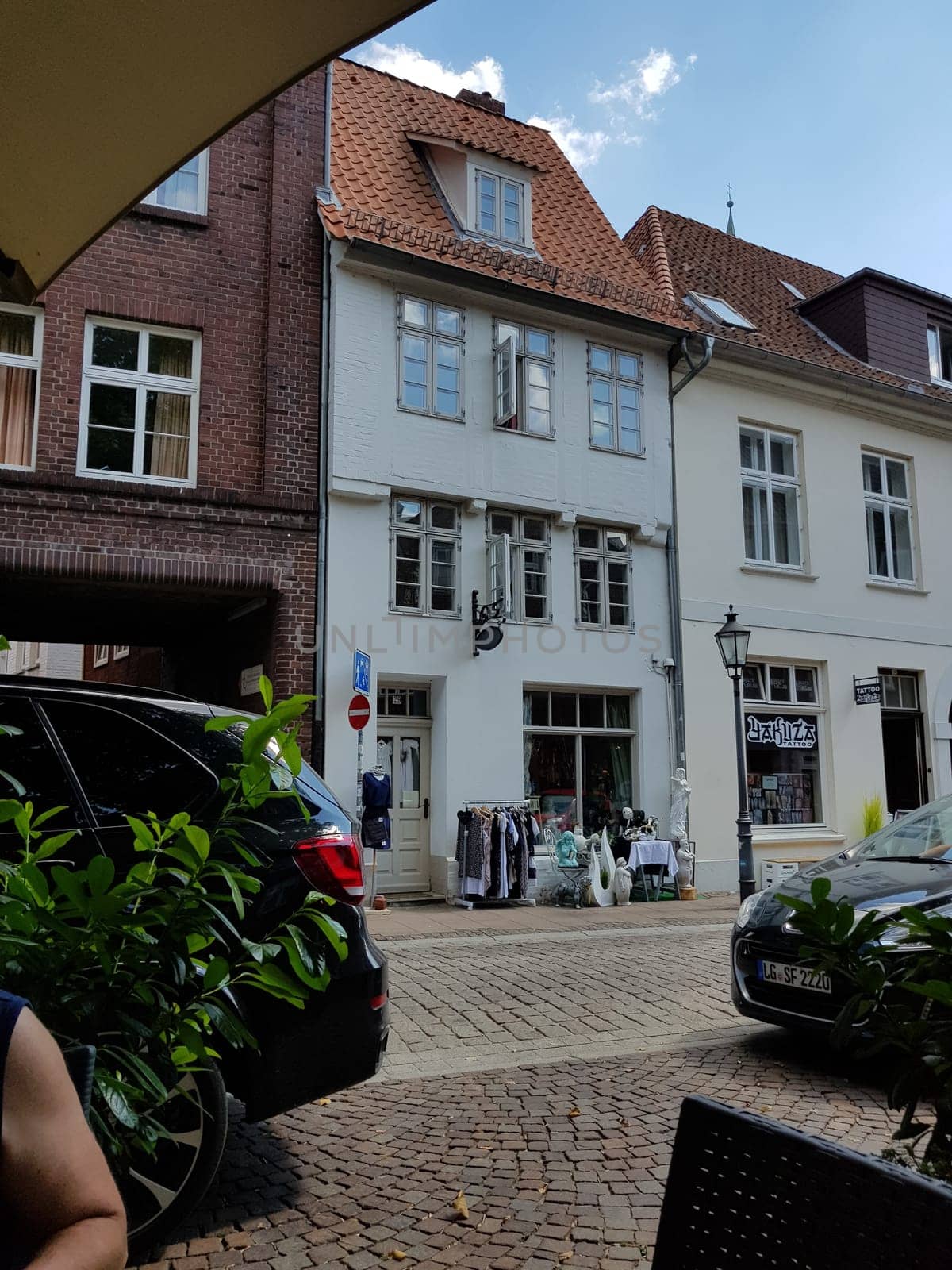 LÜNEBURG, NIEDERSACHSEN, GERMANY - JULI 27, 2018:..Small boutique in Lüneburg old town