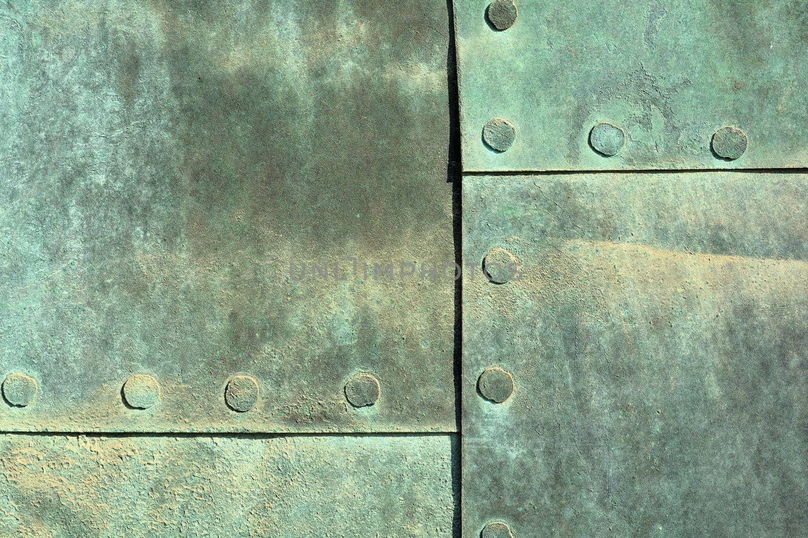 Copper sheet of an old historic door at Magdeburg Cathedral