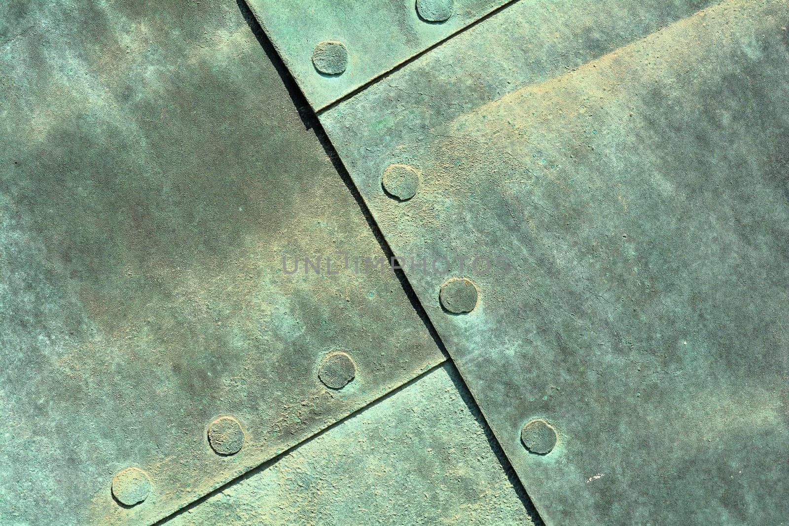 Copper sheet of an old historic door at Magdeburg Cathedral