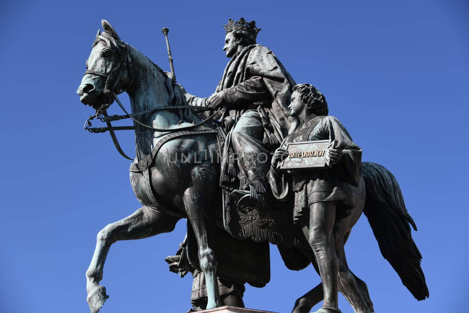 The monument to Ludwig I. King of Bavaria in Munich made of bronze. The equestrian monument was ceremoniously unveiled in 1862 at Odeonsplatz. The rider with his scepter raised is accompanied by pages who symbolize the virtues of "justice"" and"