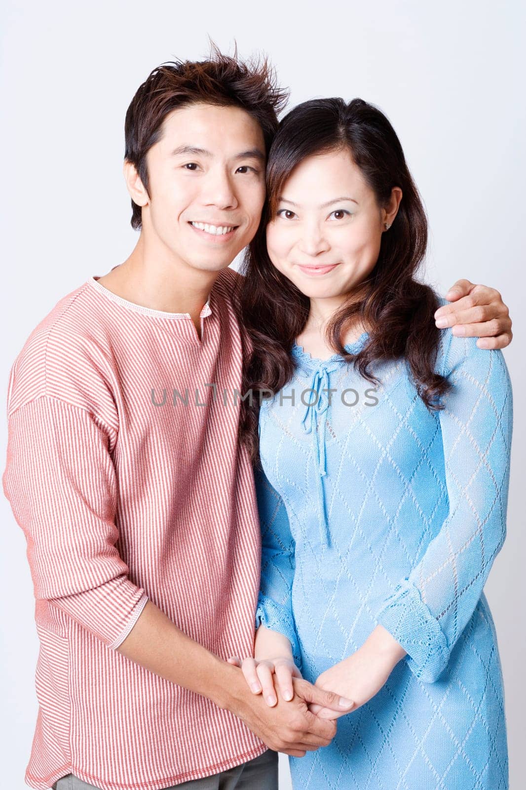 Portrait of a mid adult man and a young woman smiling