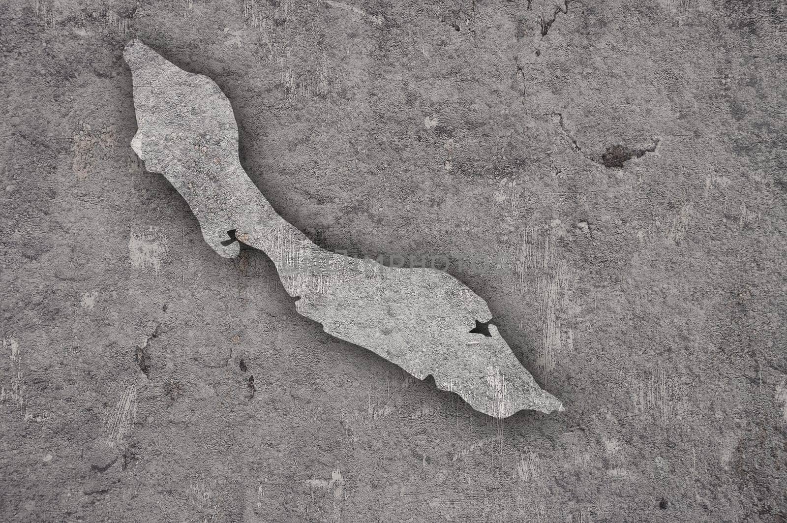 Map of Curacao on weathered concrete