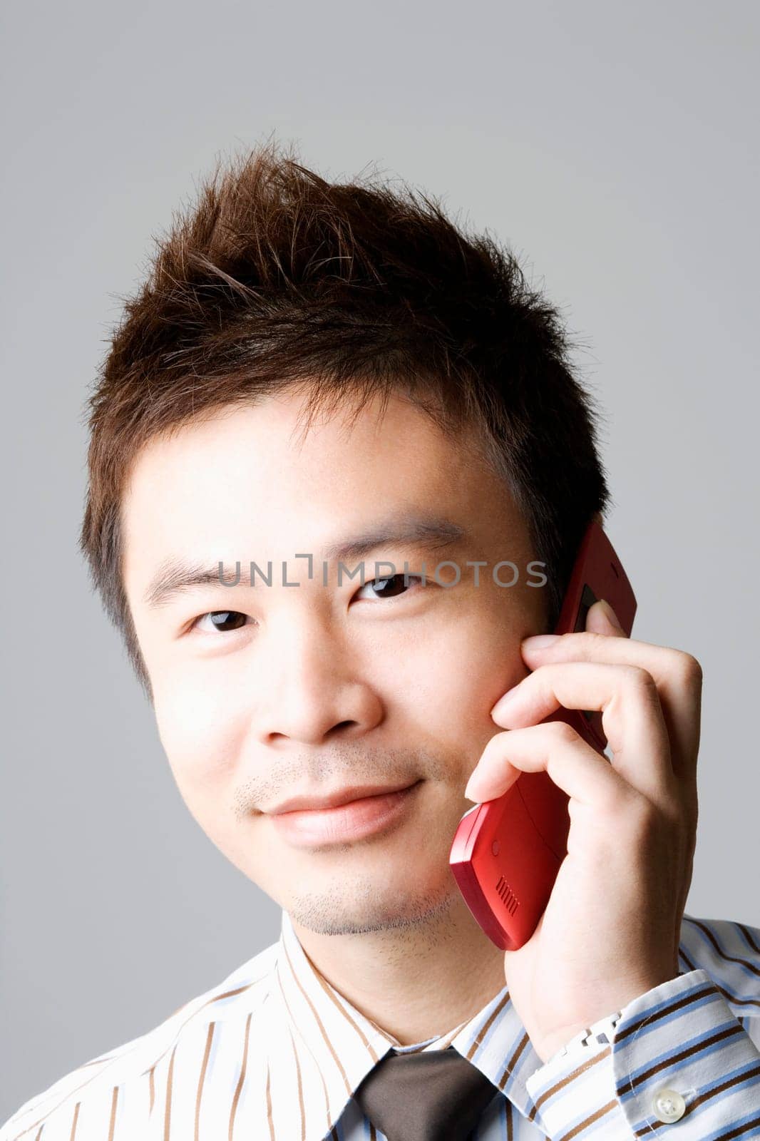 Portrait of a businessman talking on a mobile phone