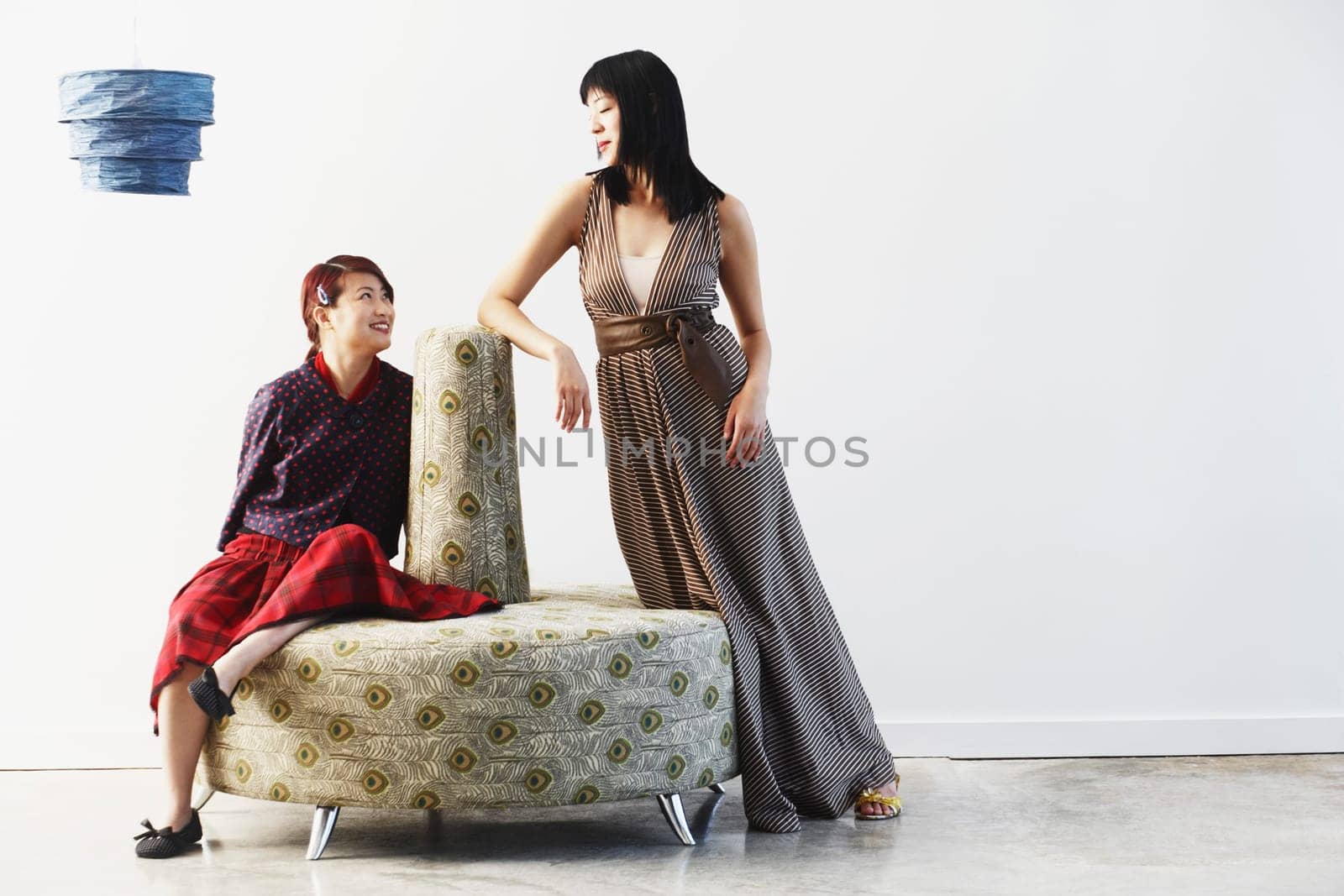 Two young women looking at each other