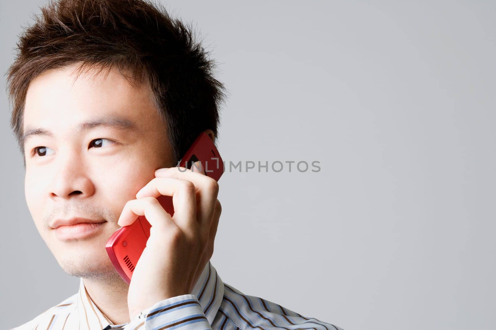 Close-up of a businessman talking on a mobile phone