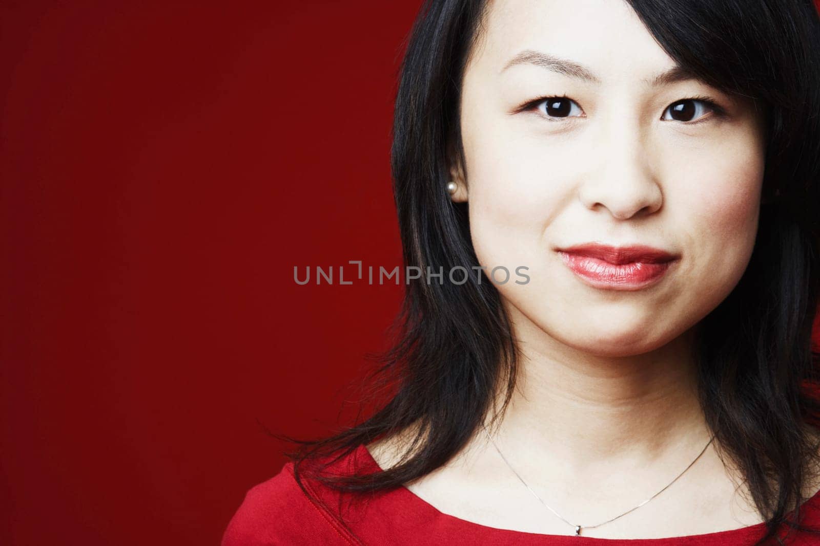 Portrait of a young woman grinning