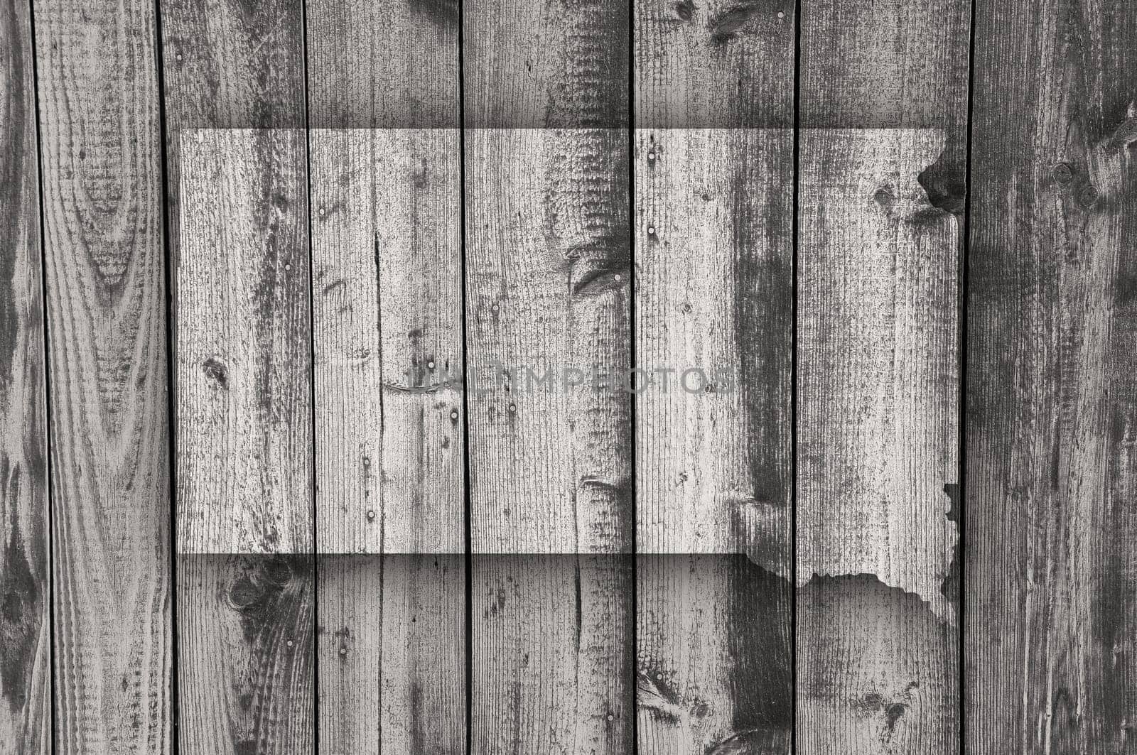 Map of South Dakota on weathered wood
